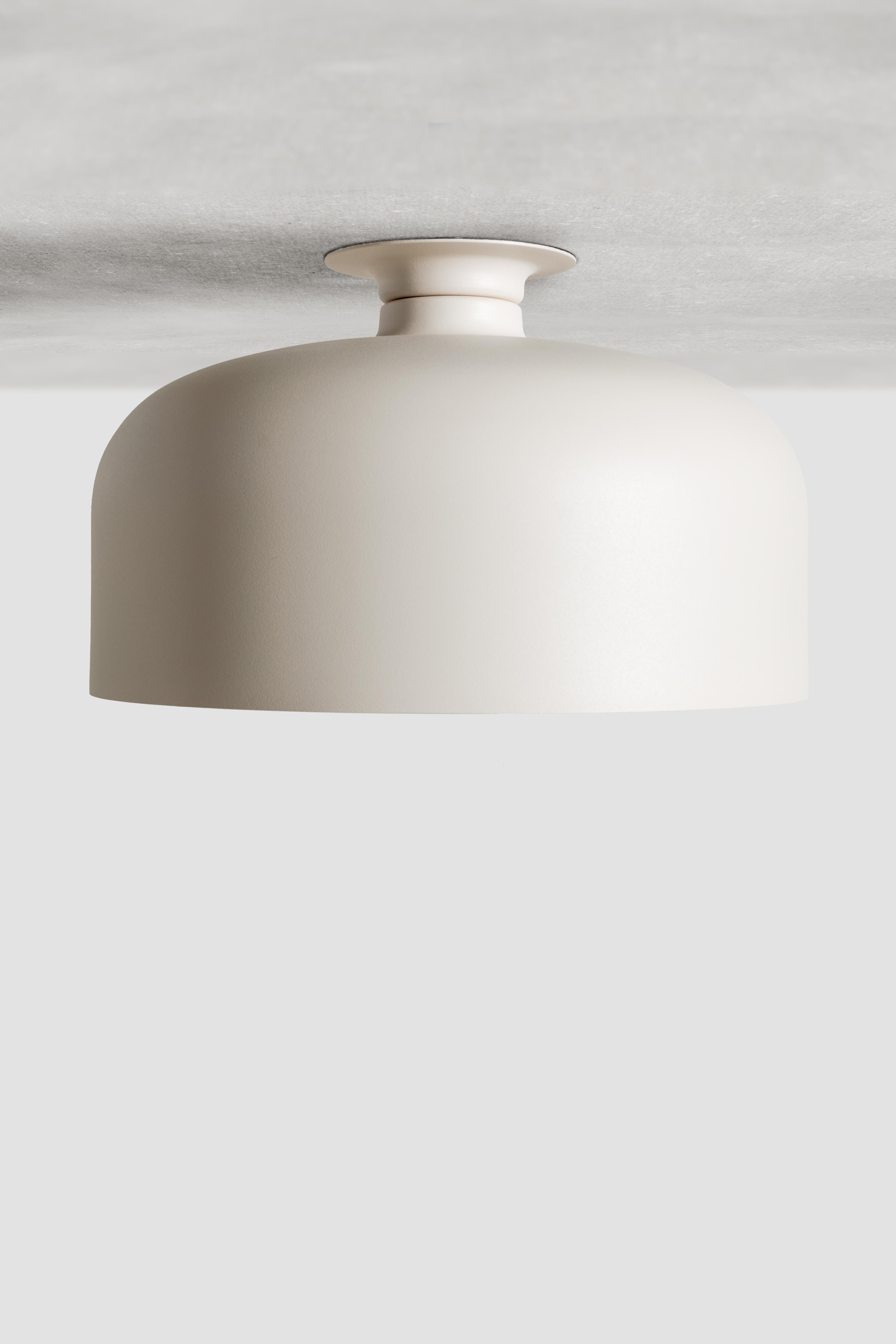 SPOTLIGHT VOLUMES, ceiling lamp / wall lamp
Design: Lukas Peet, Editor: ANDLight
UL Listed

Model shown: B

Inspired by spotlights, the Spotlight Volumes series is based on four unique shade profiles which combine in various ways. While designed
