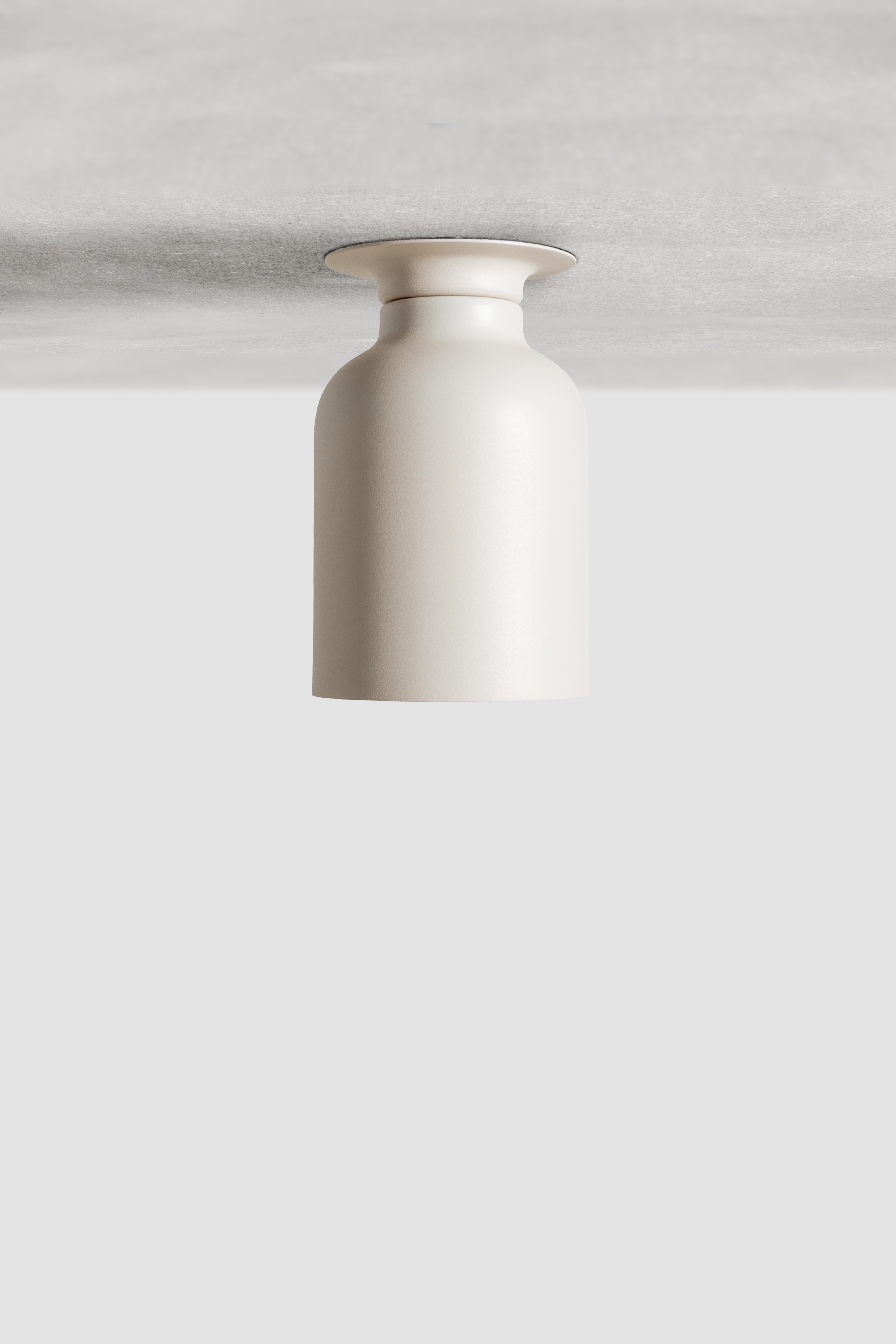 SPOTLIGHT VOLUMES, ceiling lamp / wall lamp
Design: Lukas Peet, Editor: ANDLight
UL Listed

Model shown: C

Inspired by spotlights, the Spotlight Volumes series is based on four unique shade profiles which combine in various ways. While designed