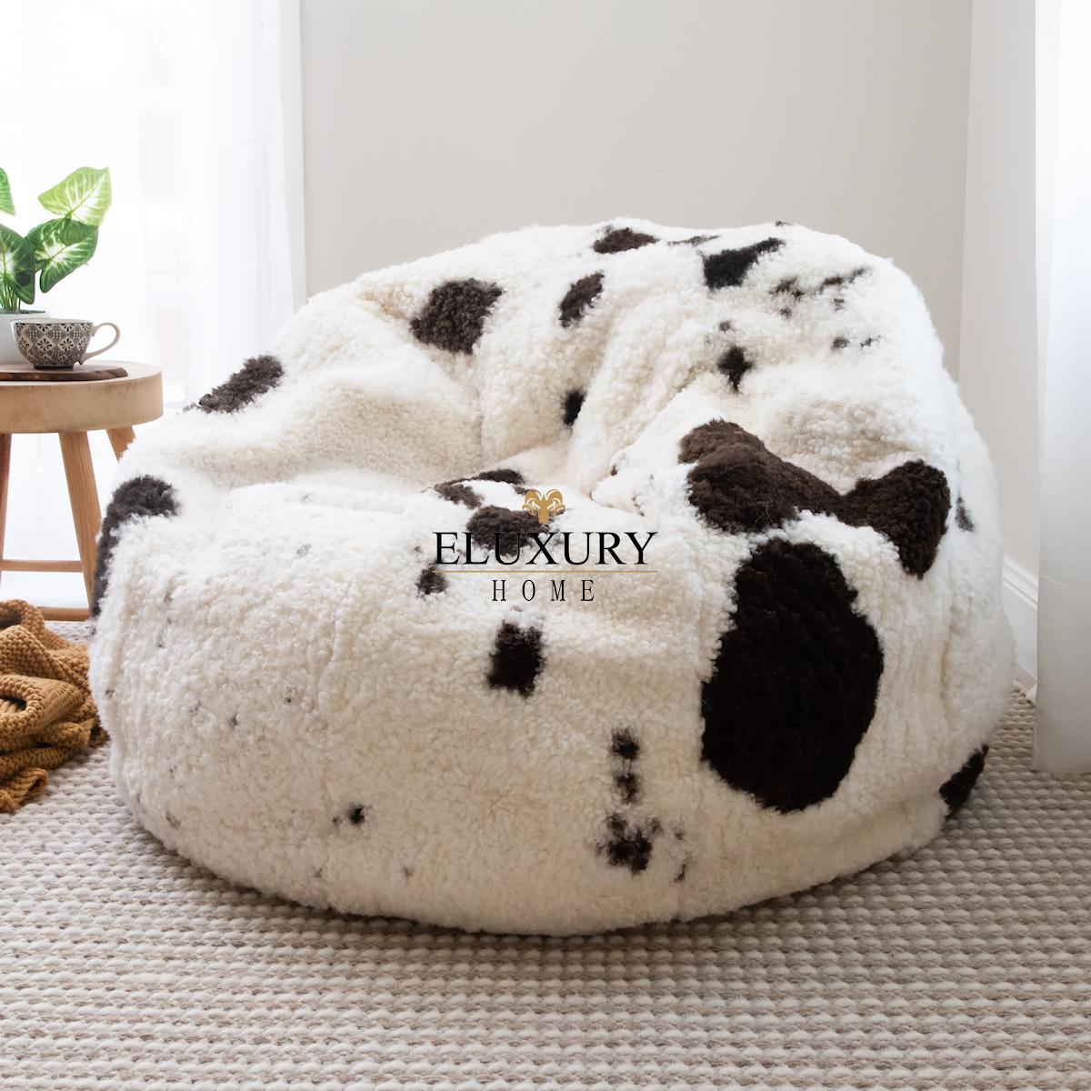 Limited Edition shearling sheepskin bean bag chair with fill. A beautiful short curly wool shearling with natural dark brown spots that are each personally pre-matched and personally selected to create this one-of-a-kind-piece.

The sheepskin wool