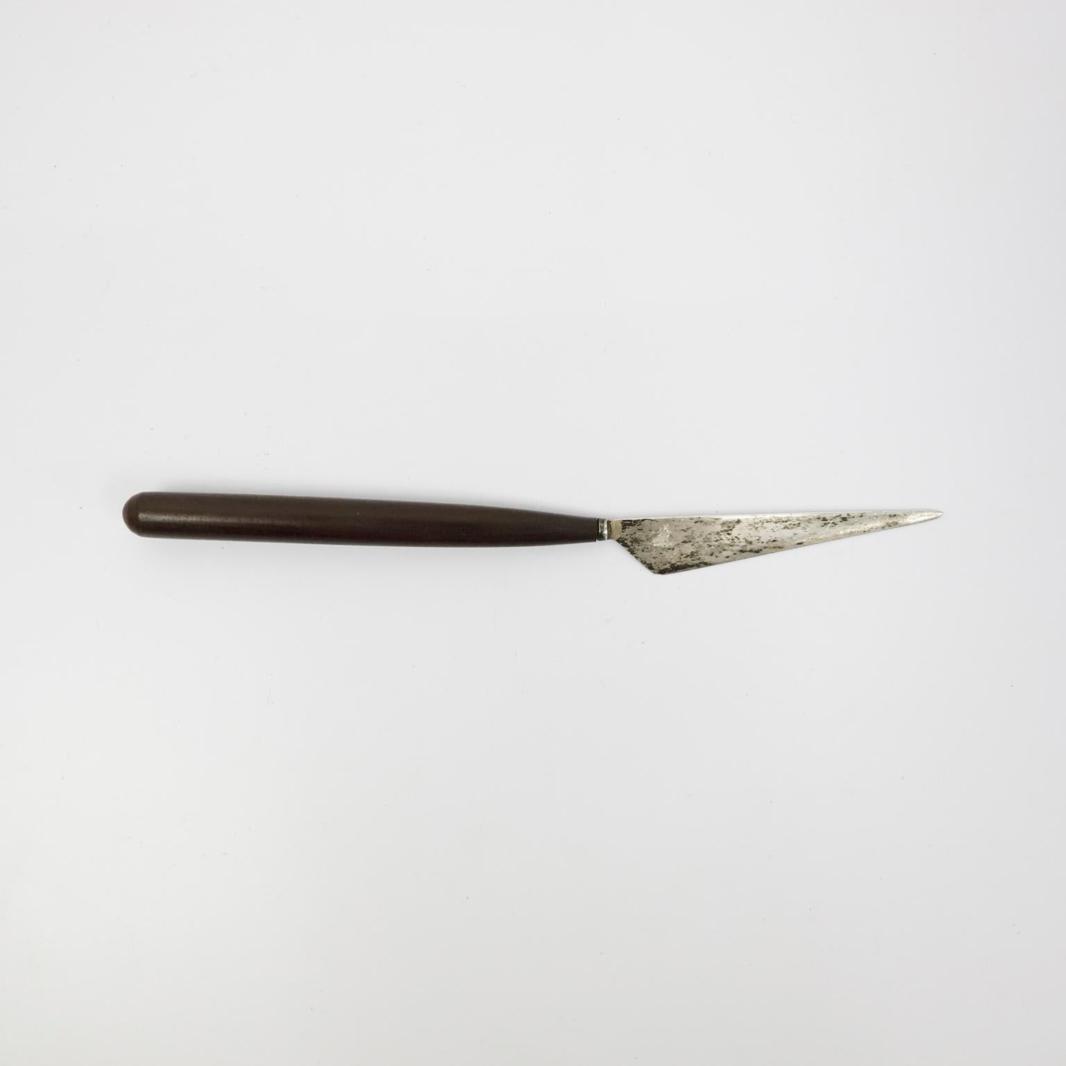 Circa 1940. We offer this rare William Spratling Sterling and Ebony Wood Letter Opener. fantastic Patina and includes original Spratling Brand.