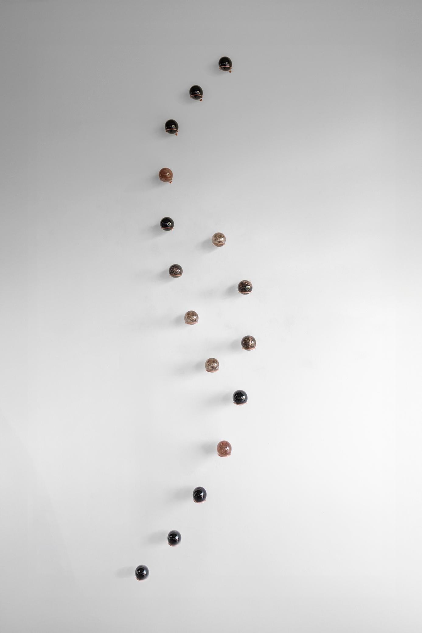 Semi-precious stones, brass holder
Composition dimensions: 157.4” W x 4.2” D x 29.1” H / 400 W X 10.9 D x 74 H cm
Edition of 15
Set of 22 spheres

**We can custom color pallet in the composition**
***Colors and textures may vary due the uniqueness