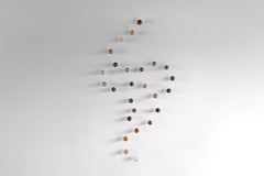 Sprawling Galaxies XVIII - Sten Studio - Wall installation with natural stones