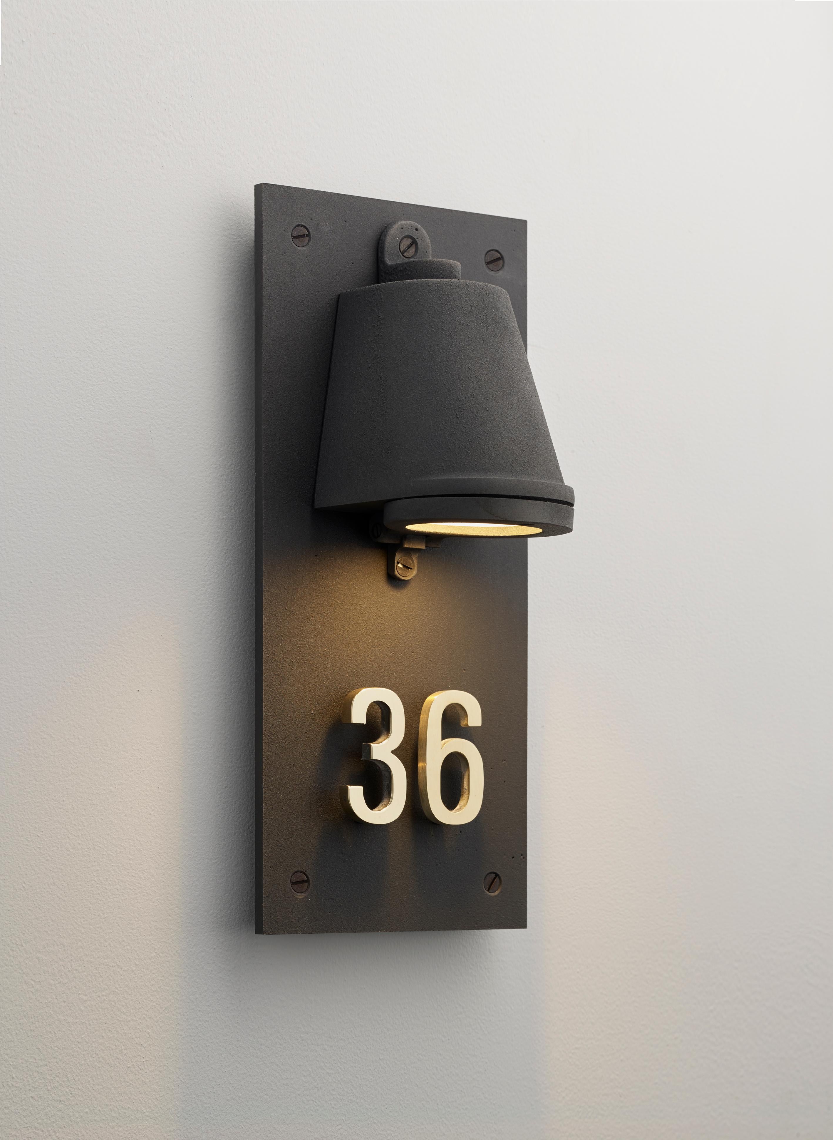 Wall light in sand casted brass with frosted glass. For outdoor use (IP43).

LED module 230V 4,3W 2700K 145lm. Main power 230V 50Hz.
