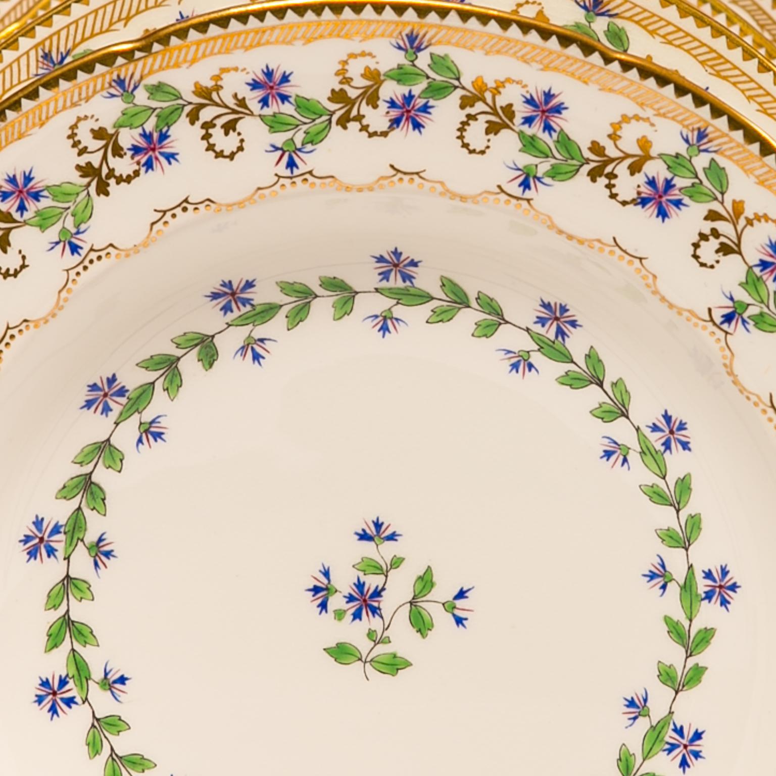 We are pleased to offer this lovely set of eight dishes decorated in the 