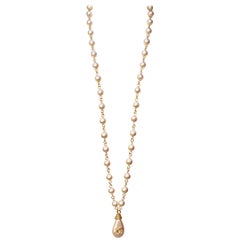 Spring 1994 Chanel pearly beads long necklace with “calisson” shaped pendant