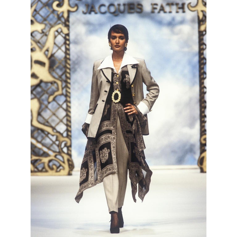 This is a fabulous vintage linen blend cream and black striped skirt suit from Jacques Fath. We are showing the jacket documented on the Jacques Fath Spring/Summer 1994 runway. The base color is a cream or natural linen with very fine black woven