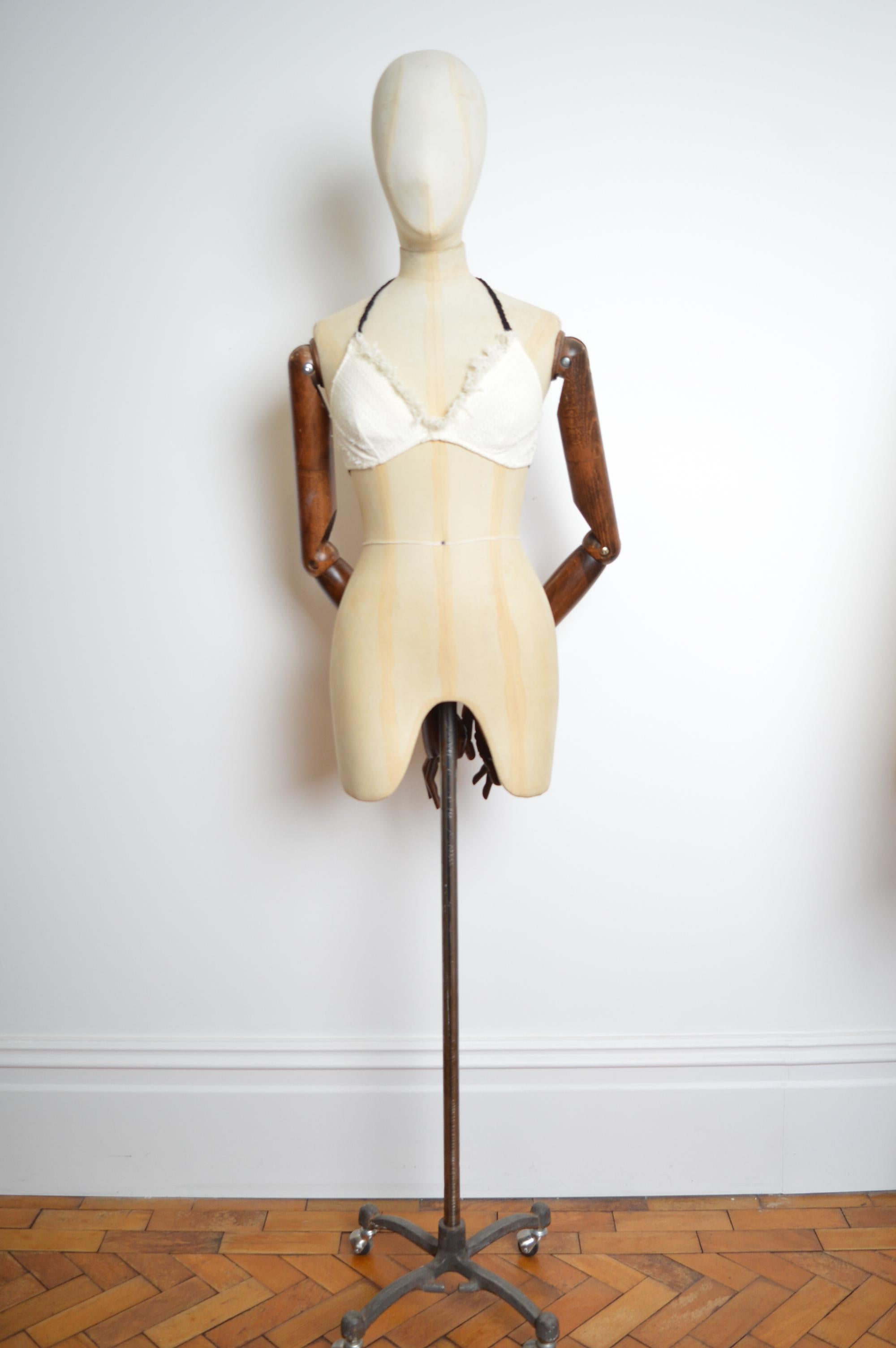 Chanel Bralet from the Spring / Summer 2008 Collection designed by Karl Lagerfeld, crafted from ivory tweed with raw lace trimmed edge, contrast Black silk neck strap and reverse as well as Antique Chrome 'CC' detailed hardware buckle. 
MADE IN