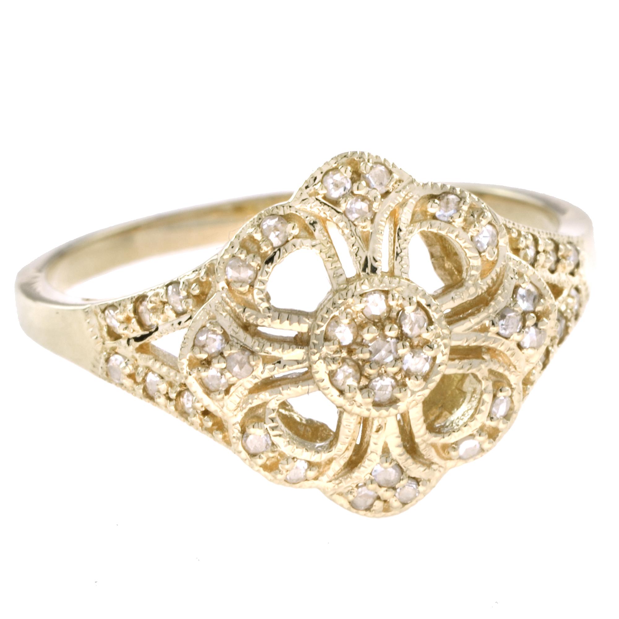 Ring gold forming an openwork flower centered a rose cut diamonds on petals. The flower turns around the central diamond.
Ring Information
Style: Vintage
Weight: 3.25 g. (approx. total weight)
Gemstones
Type: Diamond
Shape: Round
Average Color:
