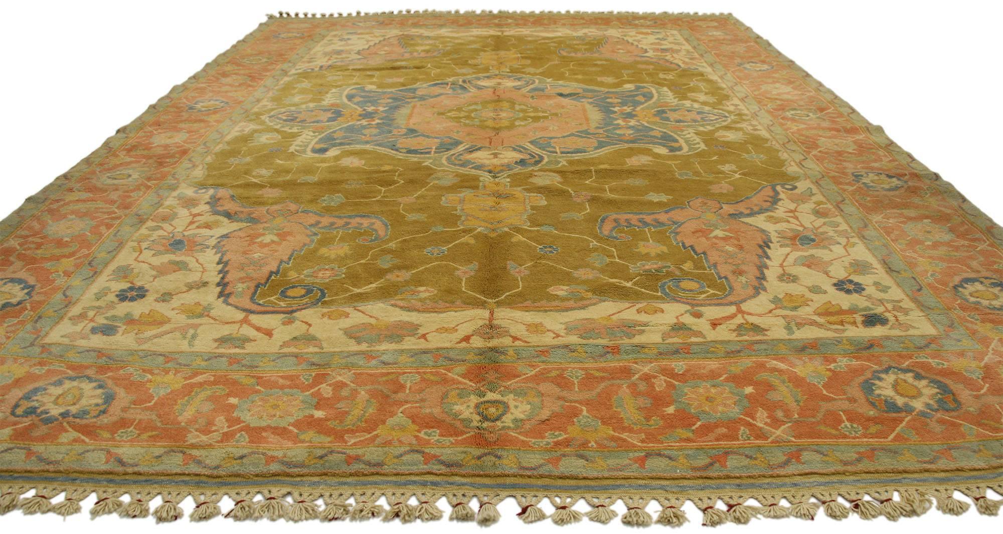 77127 Vintage Turkish Oushak Rug with Georgian Country Cottage Style 08'08 x 12'06. Go beyond feminine and into the realm of chic with this spring color vintage Turkish Oushak rug. This hand-knotted wool vintage Oushak rug features a center