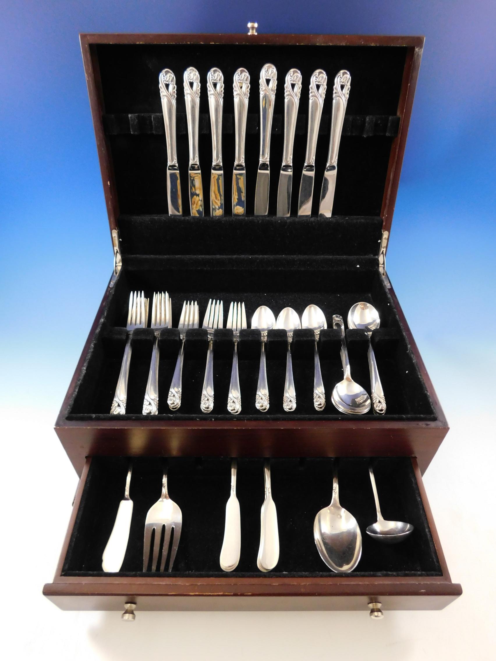 Beautiful spring glory by International sterling silver flatware set of 52 pieces. 

This set includes:

Eight knives, 9 1/8