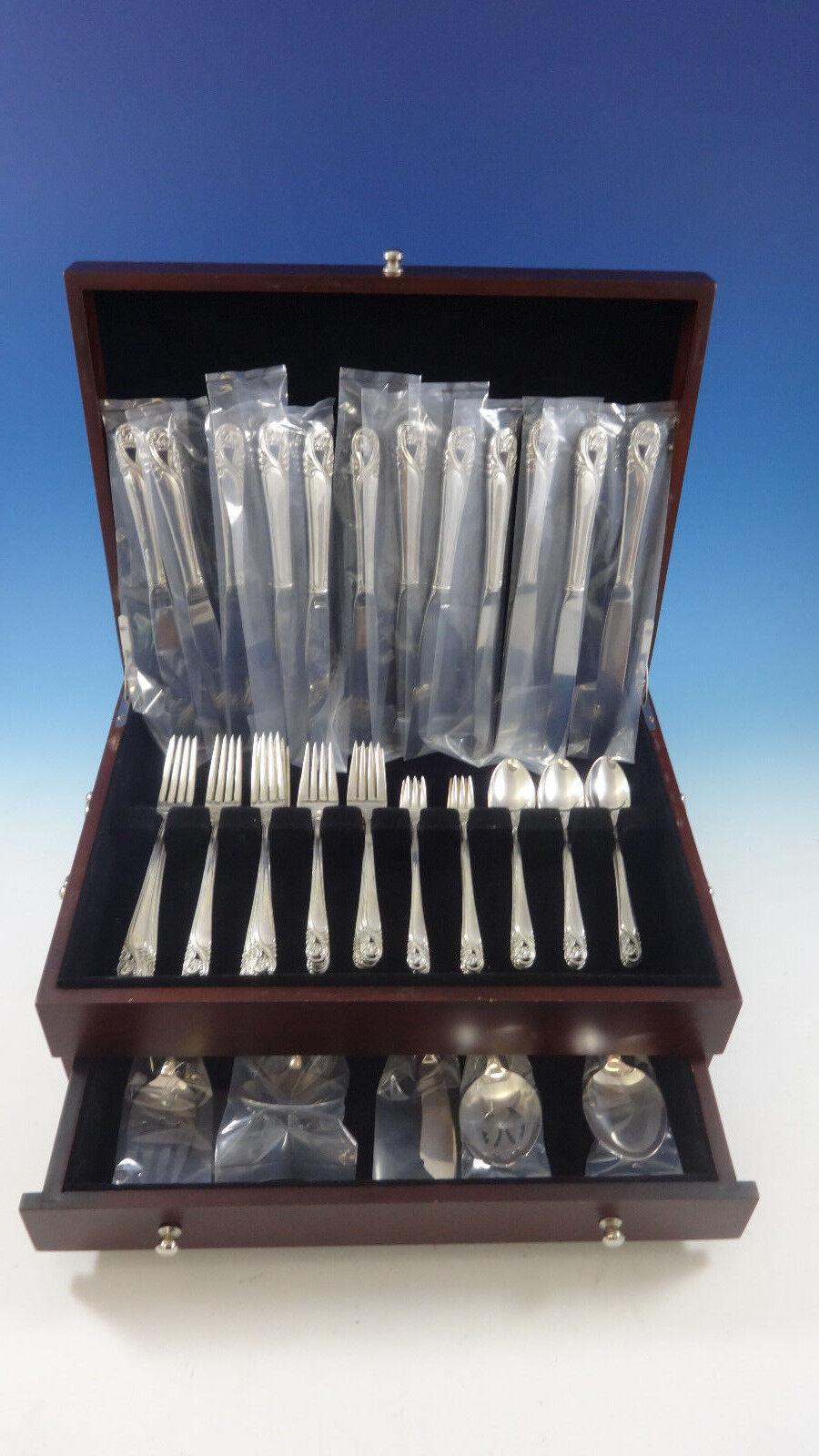 SPRING GLORY BY INTERNATIONAL sterling silver flatware set - 66 pieces. This set includes:


12 KNIVES, 9 1/4