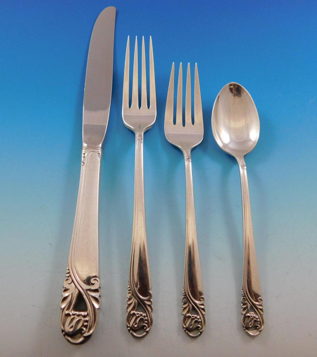 Spring Glory by International sterling silver flatware set of 48 pieces. This pattern was introduced by International in the year 1942 and was designed by Lillian V.M. Helander, daughter of Swedish immigrants - a true pioneer woman designer in the
