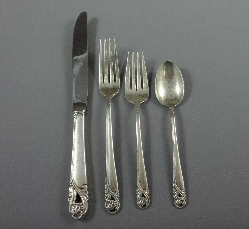 SPRING GLORY BY INTERNATIONAL Sterling Silver flatware set - 50 piece set. This set includes:

8 KNIVES, 9 1/4