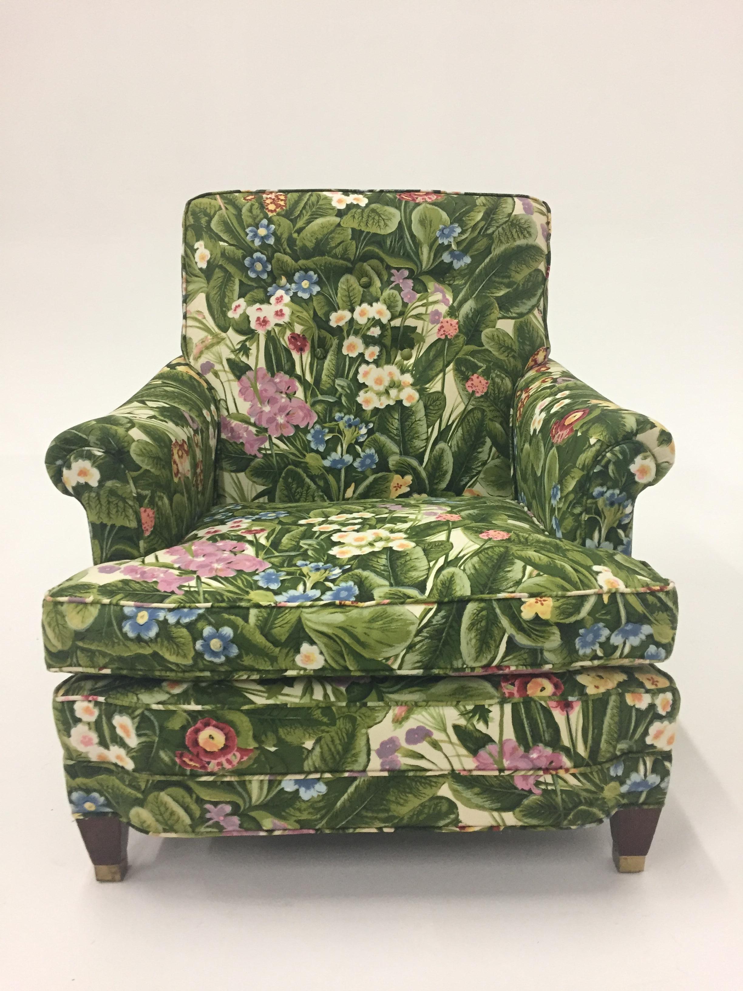 A beautiful quality matching upholstered Classic club chair and ottoman with a Spring inspired contemporary fresh floral fabric. Handsome mahogany feel and there are brass casters on the ottoman. 
seat height 16
Measures: ottoman 24W x 18D x 14H.