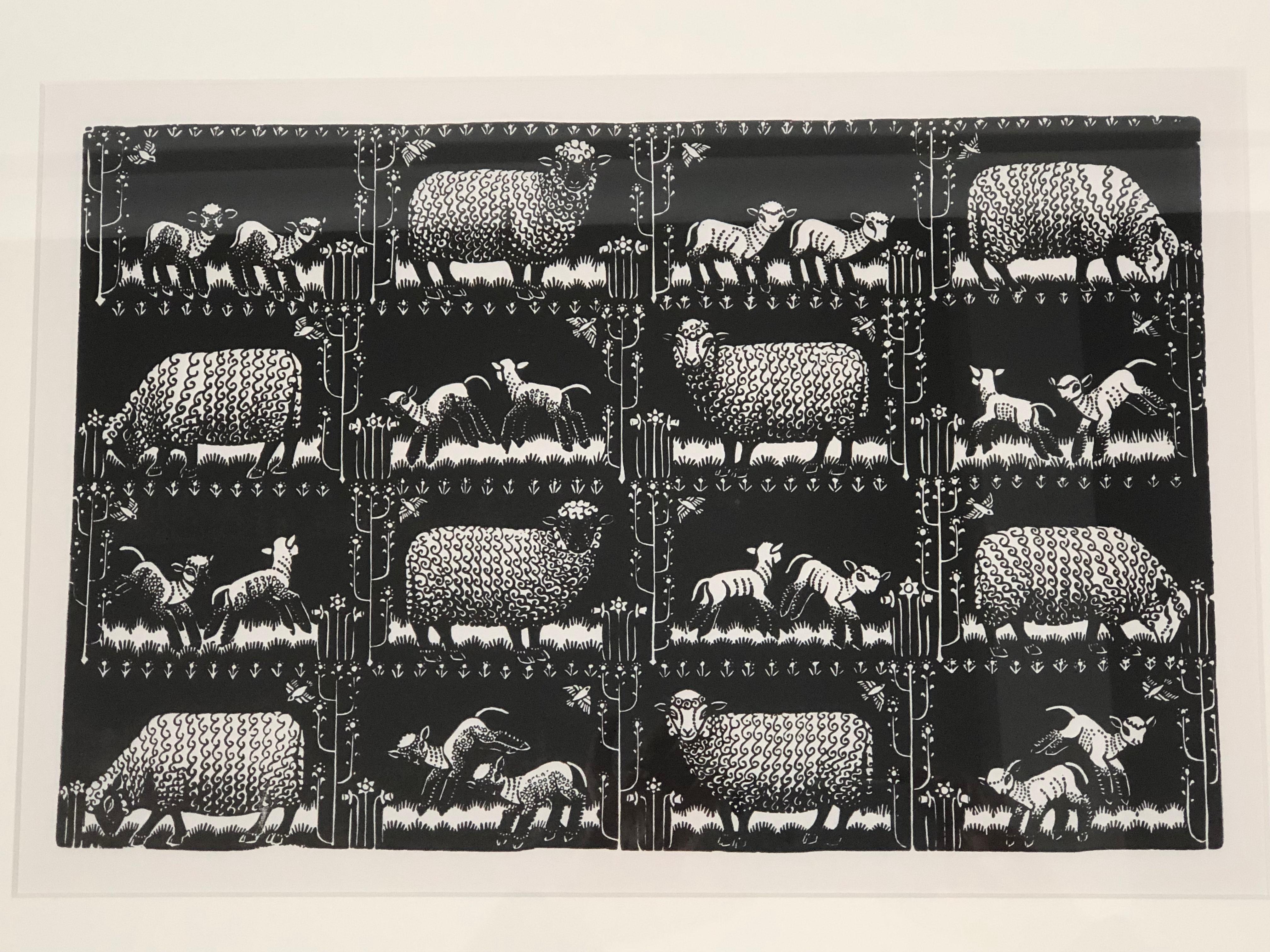 A black and white hand block print on paper of the Folly Cove Designers' Spring Lambs II pattern by Virginia Lee Burton Demetrios, circa 1951, depicting a grid of 16 vignettes of stylized sheep with their frolicking baby lambs, within stylized