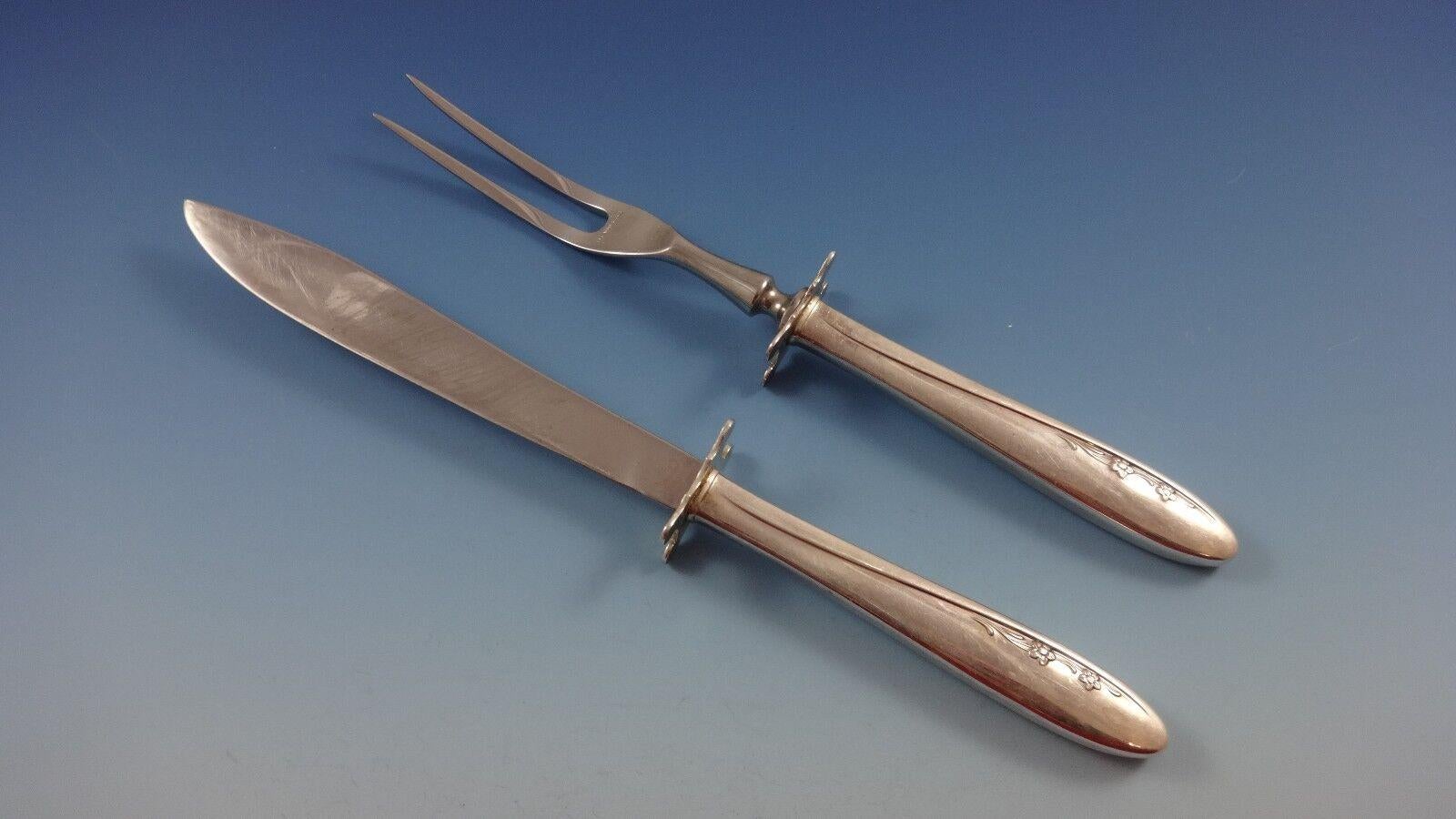 SPRING SERENADE BY LUNT Besteck aus Sterlingsilber - 38 Teile. Dieses Set enthält:

8 MESSER, 9 1/4