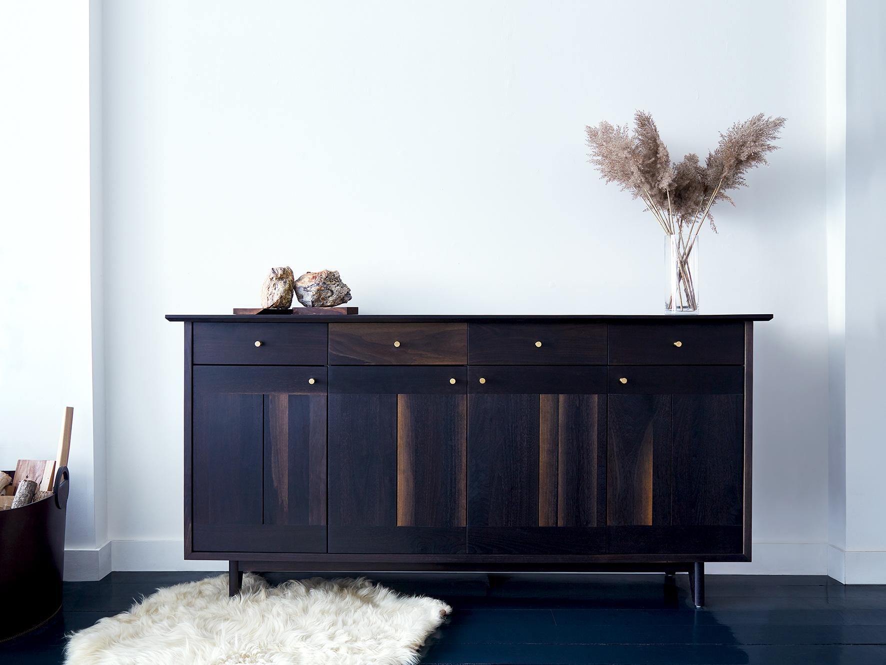 The spring sideboard features leather or turned hardwood or brass pulls. Available in Claro walnut, Eastern black walnut, maple (natural, bleached, or oxidized), cherry and white oak (natural or oxidized).

Casing available in Bleached Maple,
