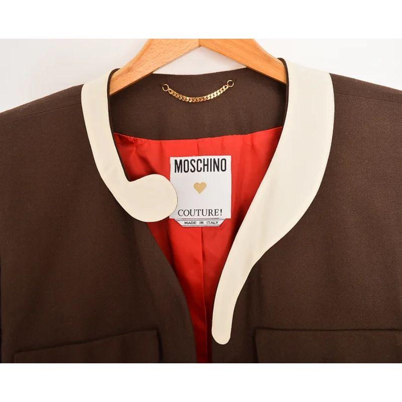 Spring / Summer 1994 MOSCHINO Couture Question mark jacket.
(LOOK 19)

This Superb example of a vintage Moschino Couture 'Question Mark' boucle jacket comes in chocolate brown with an off white Question mark appliqué collar and is fully lined in
