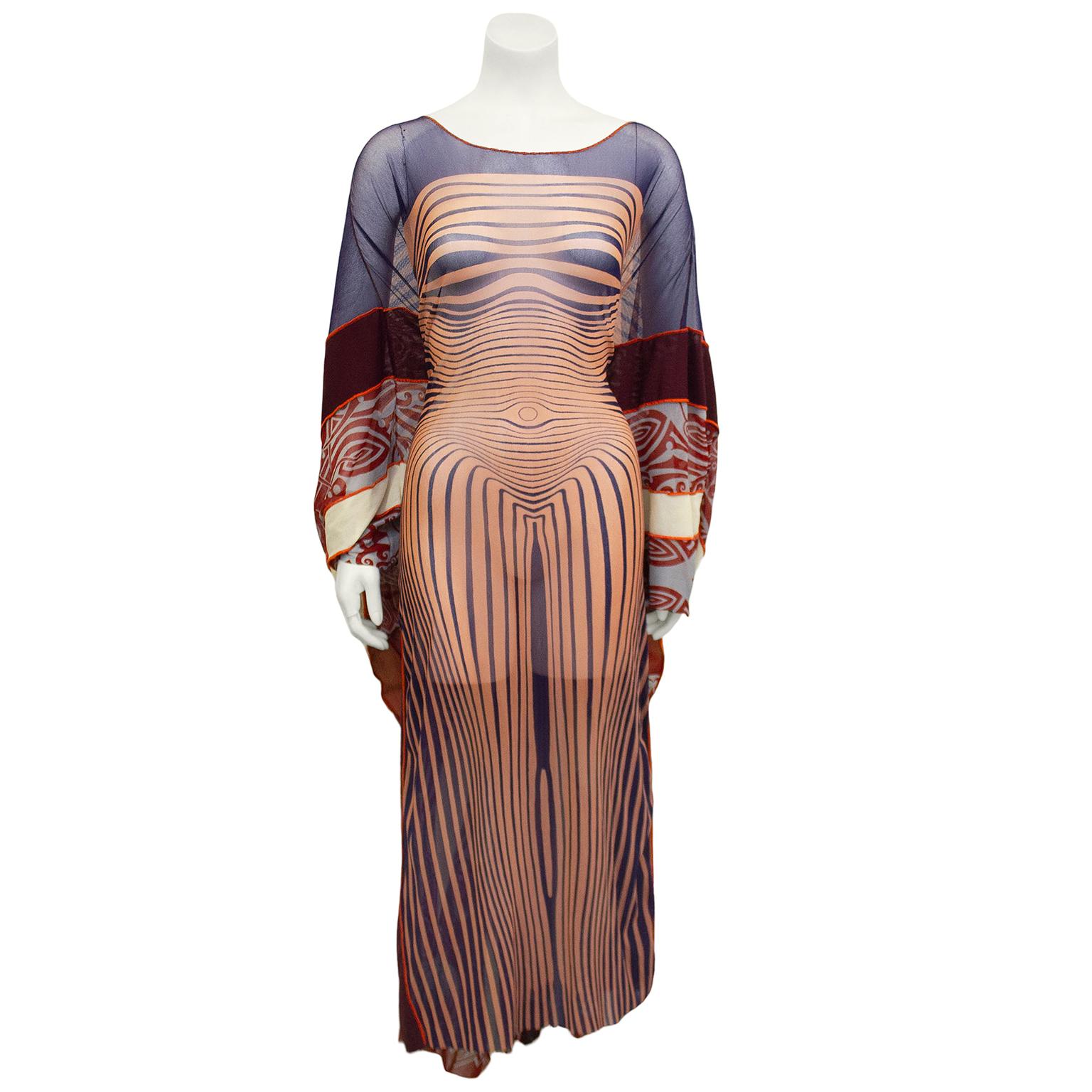 Amazing & rare Jean Paul Gaultier kaftan from the spring/summer 1996 collection. Sheer mesh maxi kaftan dress featuring the iconic Gaultier body contour illusion print and tribal tattoo design details. Shoulders feature deep purple mesh that
