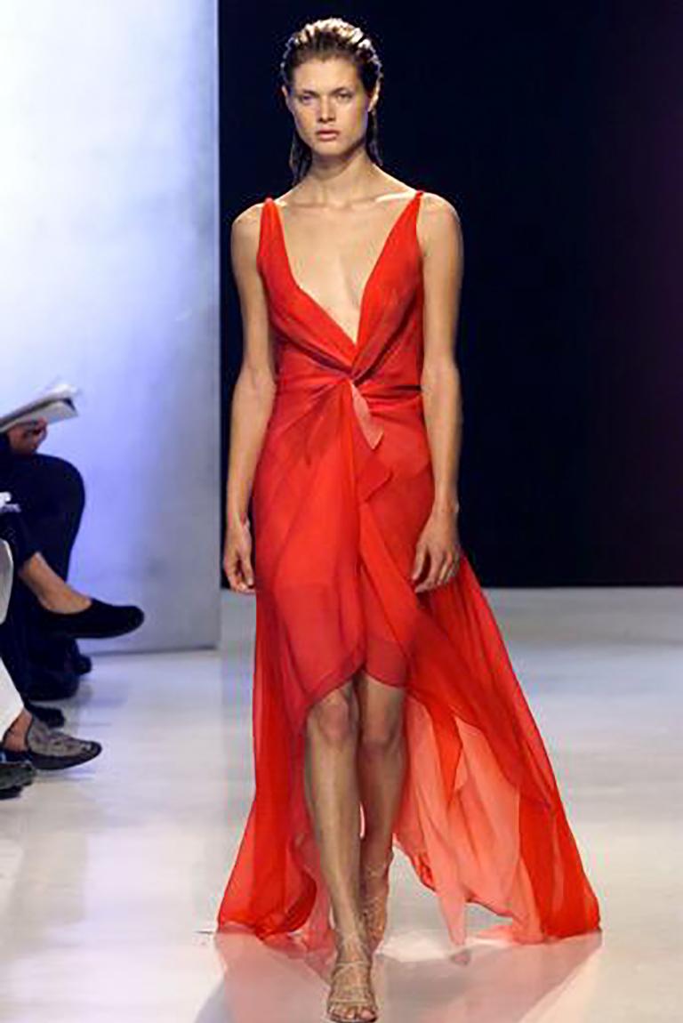 The iconic Spring/Summer 2000 red watercolor runway dress by Donna Karan. Bias cut layered silk chiffon in shades of red and peach with a faint abstract floral pattern. Sleeveless with a v neckline that can deepen, depending on how you want to style
