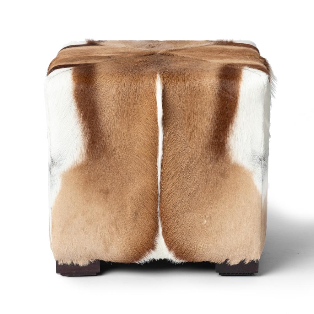 Hand-made in Africa with ethically-sourced Springbok hide, each Springbok Hide Cube Ottoman is created with four unique hides chosen to craft a unique, contemporary piece. The individuality of each hide makes each ottoman a truly one-of-a-kind piece