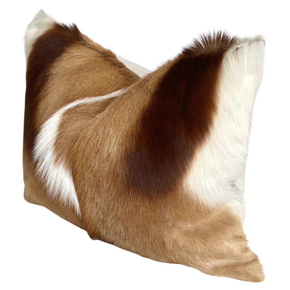 Complete an interior with this alluring, Springbok pillow, created by designer Emily Barbara. Each pillow is individually handcrafted from genuine, high-quality, and natural by-product springbok ethically sourced from South Africa.

This charming
