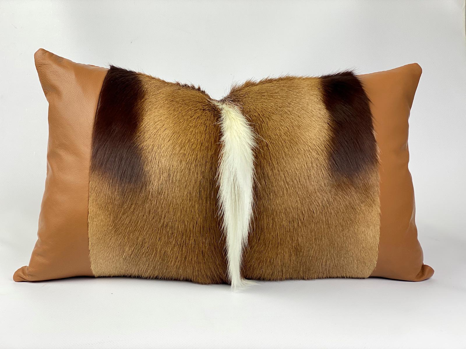 Add exotic textures to your decor with this large lumbar Springbok pillow. Australian Designer, Emily Barbara personally selects each African Springbok skin ensuring quality and softness as she captures the striking golden color tones found in each