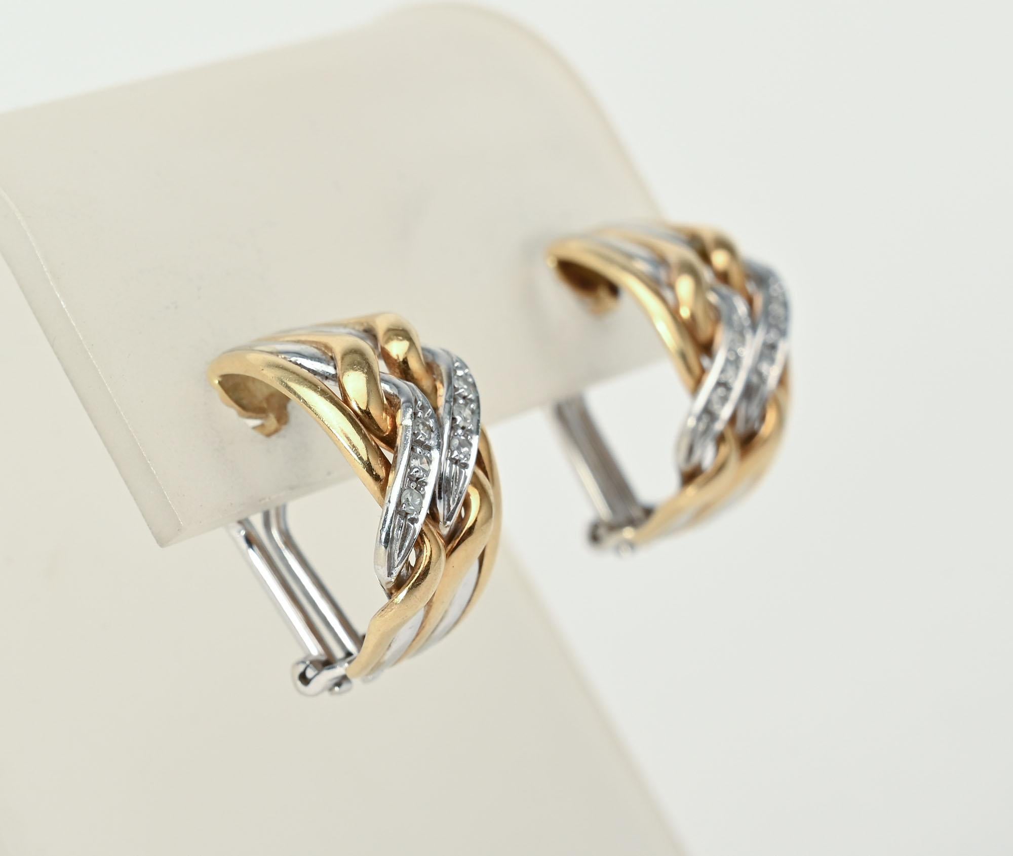 Wonderfully all the time wearable hoop earrings by Spritzer and Furman. They are made of 18 karat yellow and white gold with diamonds. The earrings measure 3/4