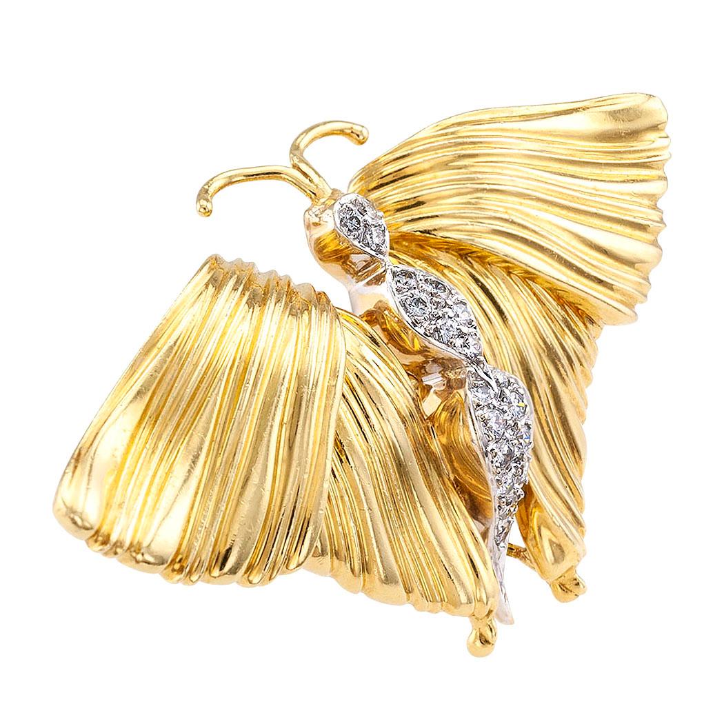 Spritzer & Fuhrman diamond and yellow gold butterfly brooch circa 1980.

DETAILS:

DIAMONDS: nineteen round brilliant-cut diamonds totaling approximately 0.40 carat, approximately H color, VS clarity

METAL: 18-karat yellow gold decorated throughout