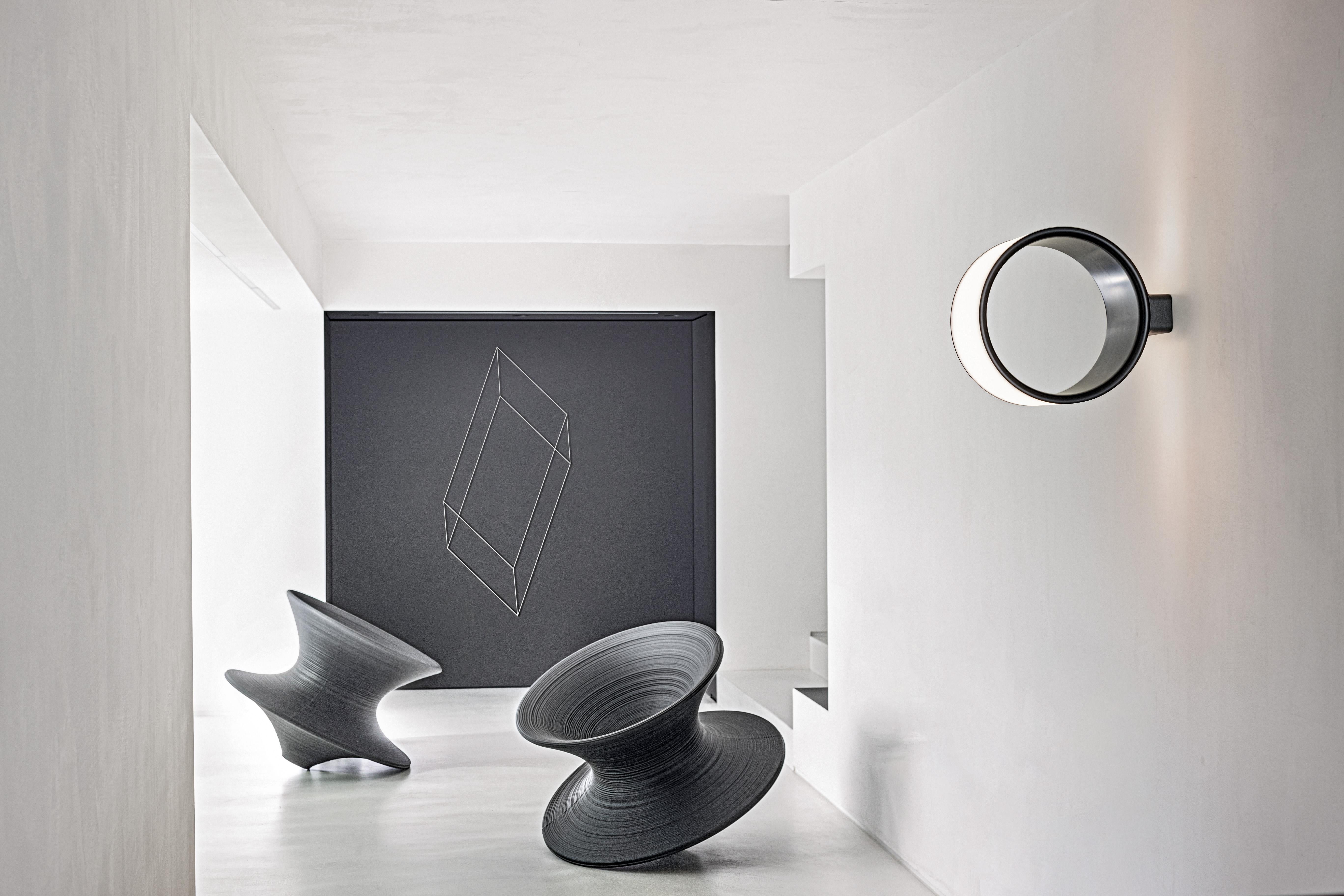 Not just a new seat, a new concept in seating and sitting: Spun. Its harmonious, dynamic and perfectly symmetric shape is reminiscent of a cotton reel, a top that spins on its axis or a vase thrown on a potter’s wheel. A captivating contemporary