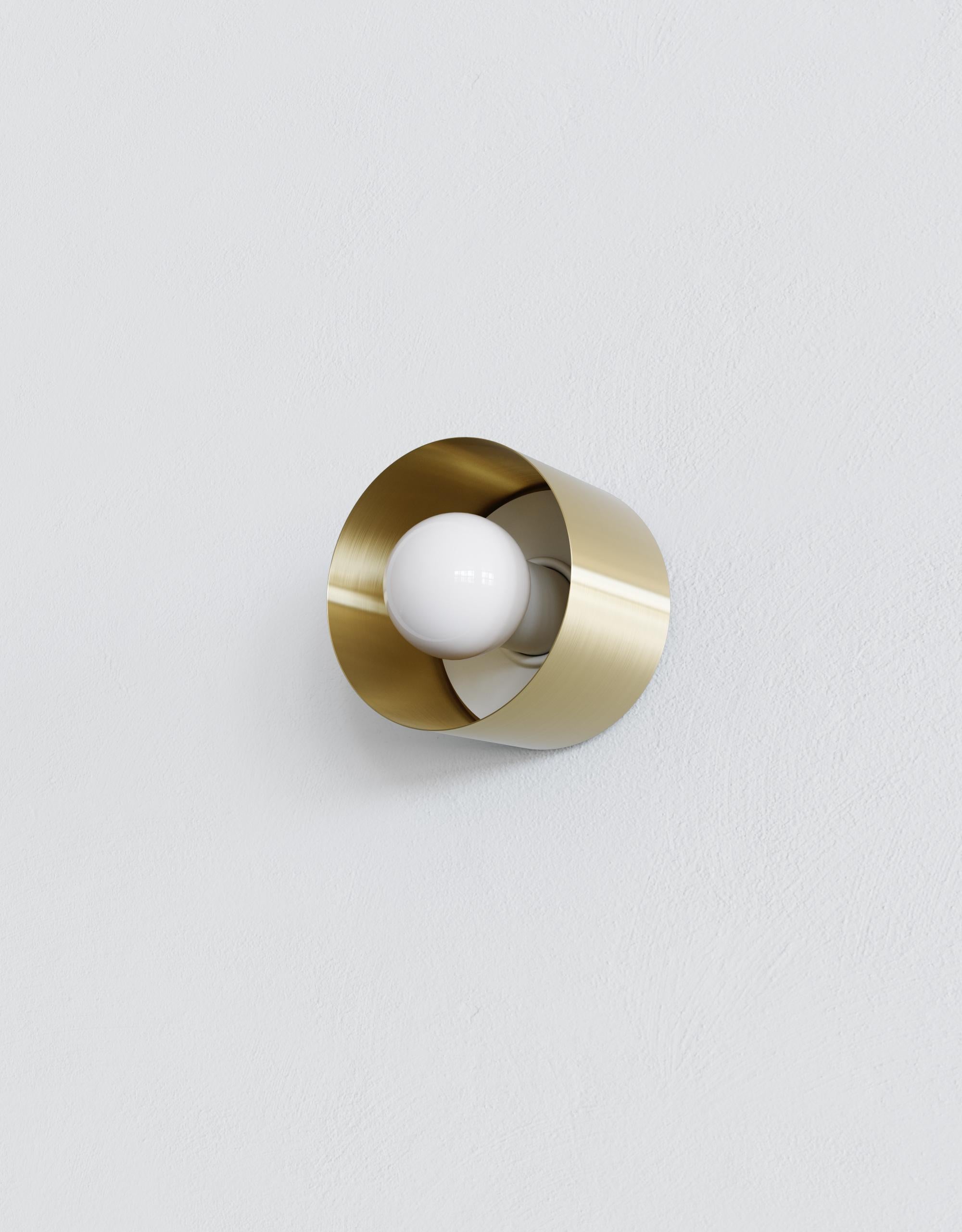 As if designing jewelry, Spun was created considered how each lighting component could complement the other to create tidy elegant compositions. Spun features a polished brass, matte black, or frosted glass shade, which encases an exposed globe