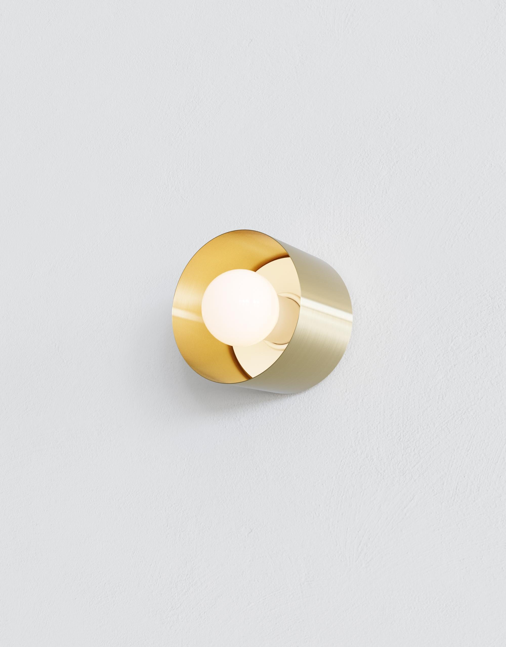 As if designing jewelry, Spun was created considered how each lighting component could complement the other to create tidy elegant compositions. Spun features a polished brass, matte black, or frosted glass shade, which encases an exposed globe