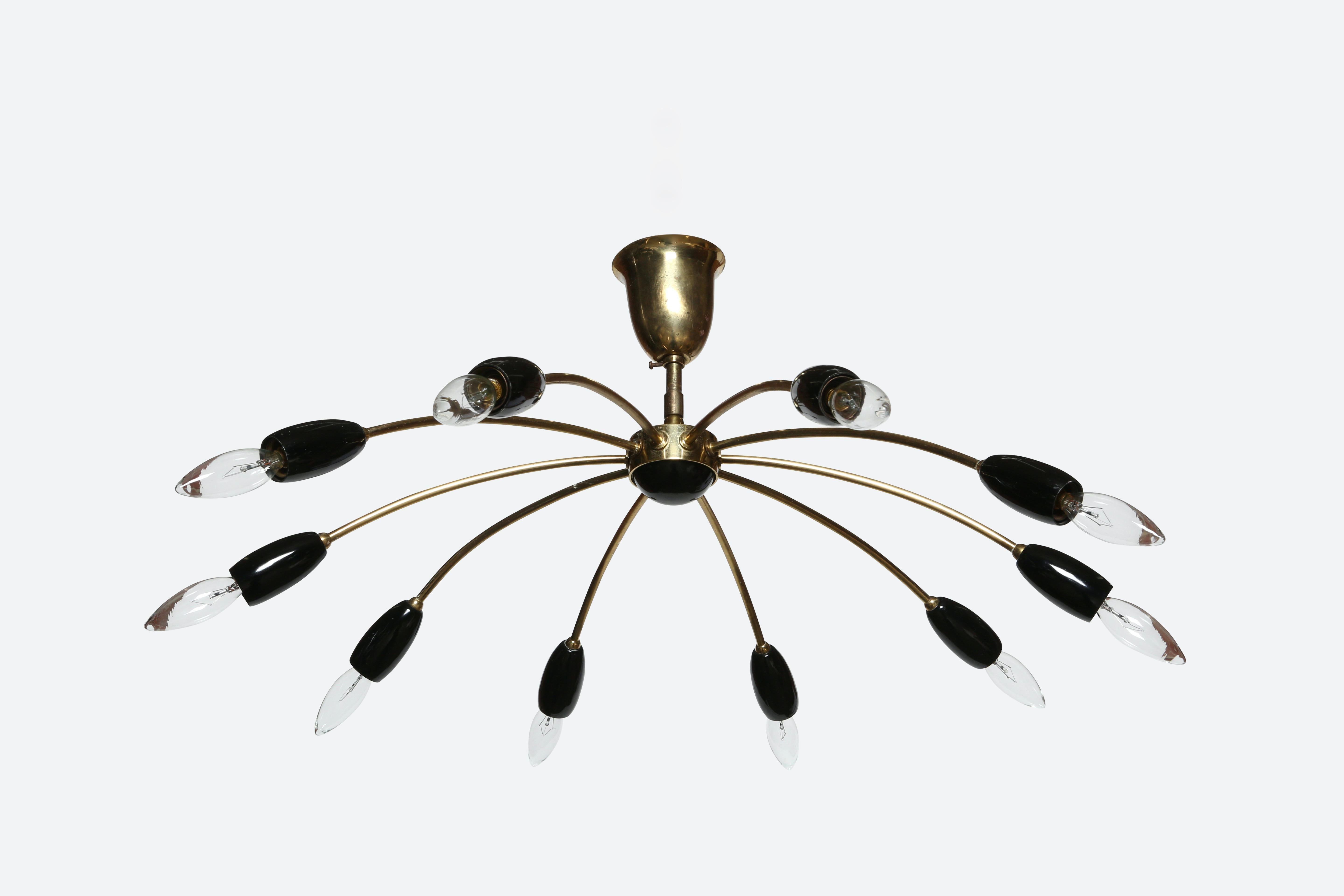 Sputnik brass chandelier
Germany 1960s
10 arms with candelabra sockets.