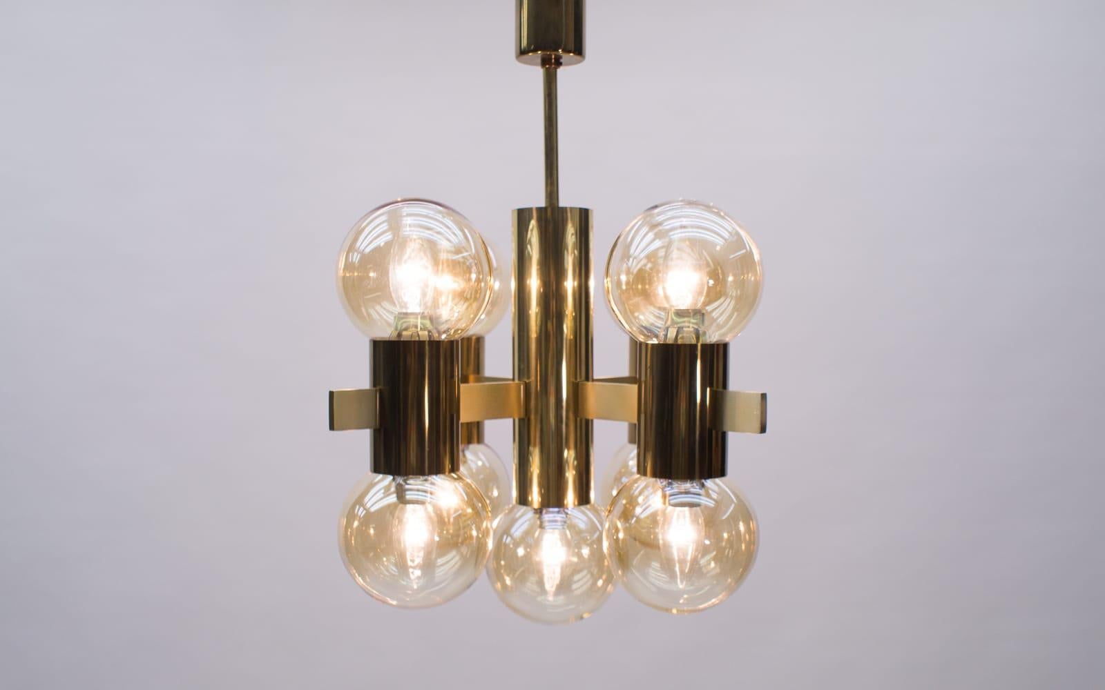 Elegant Mid-Century Modern floor lamp. 

Designed probably by Hans-Agne Jakobsson for Markaryd, Sweden in 1960s.

Executed in massive brass. The chandelier needs 9 x E14 Edison screw fit bulb.

They are wired, in working condition and run both