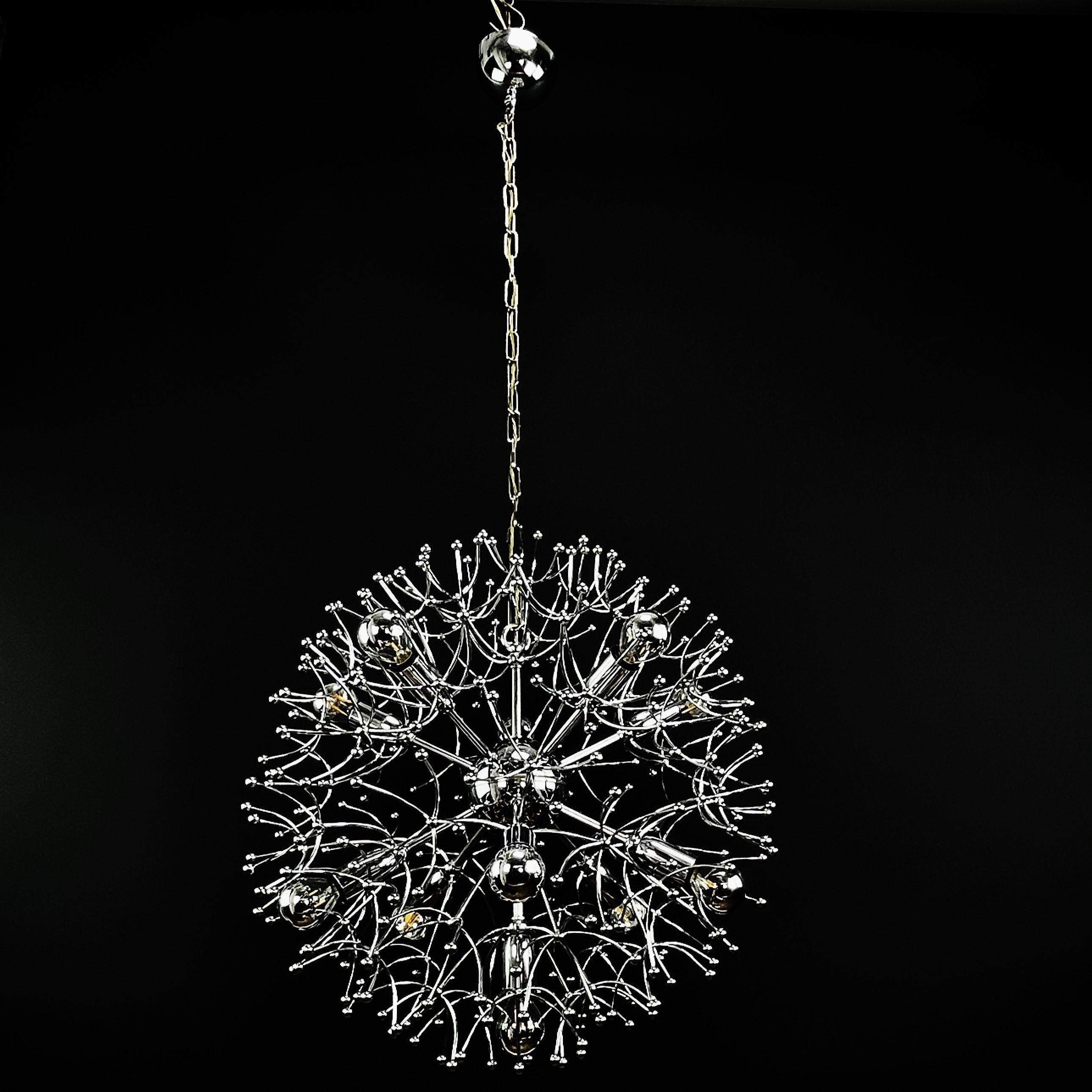 Sputnik ceiling lamp by Sciolary - 1970s.

The striking design of this ceiling lamp consists of delicate chrome leaves that radiate from the central core. The arrangement is reminiscent of the feathery seeds of a dandelion blowing in the wind. The