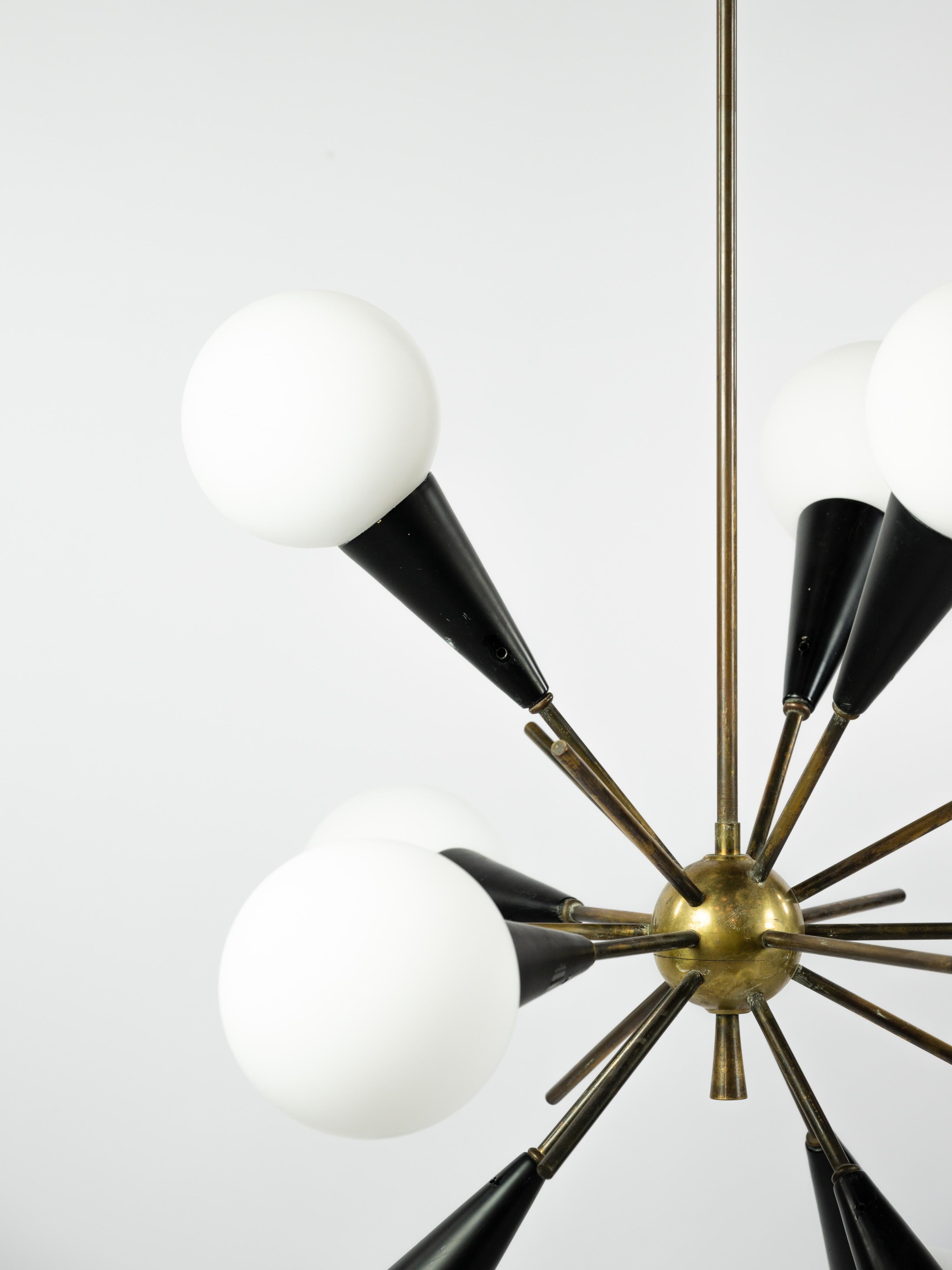 Sputnik chandelier in brass, black lacquered metal and opaline glass

9 lights 

Lovely brass patina 

D 70/75cm x H 100cm 

Good Condition 

More information upon request 
