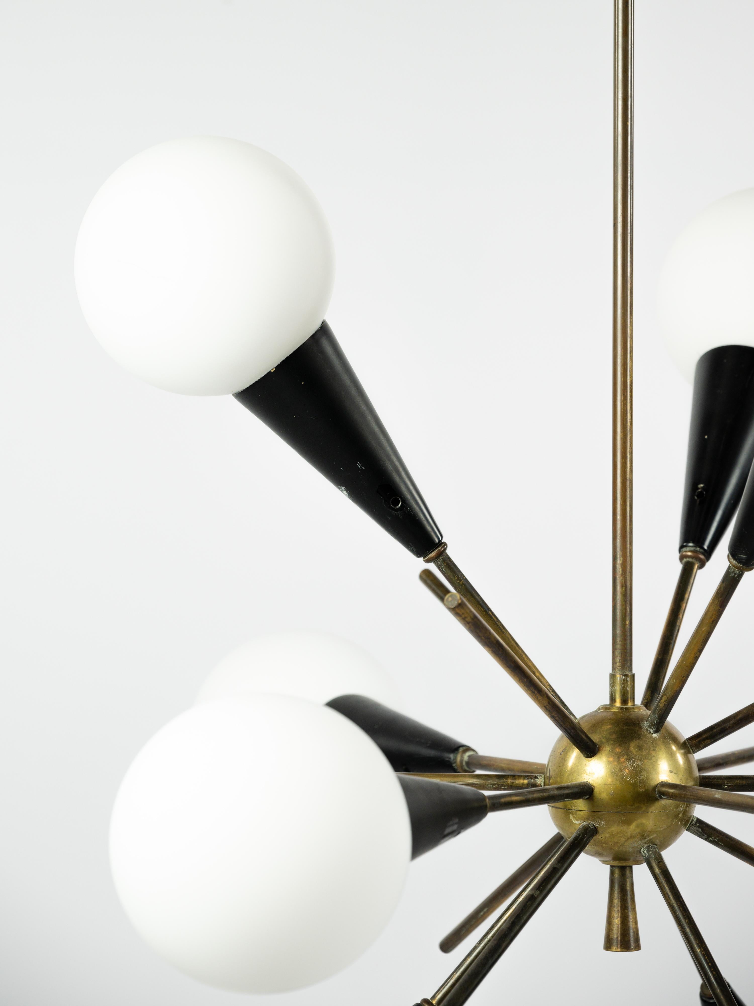 Mid-Century Modern Sputnik chandelier in brass, lacquered black metal and opaline glass For Sale