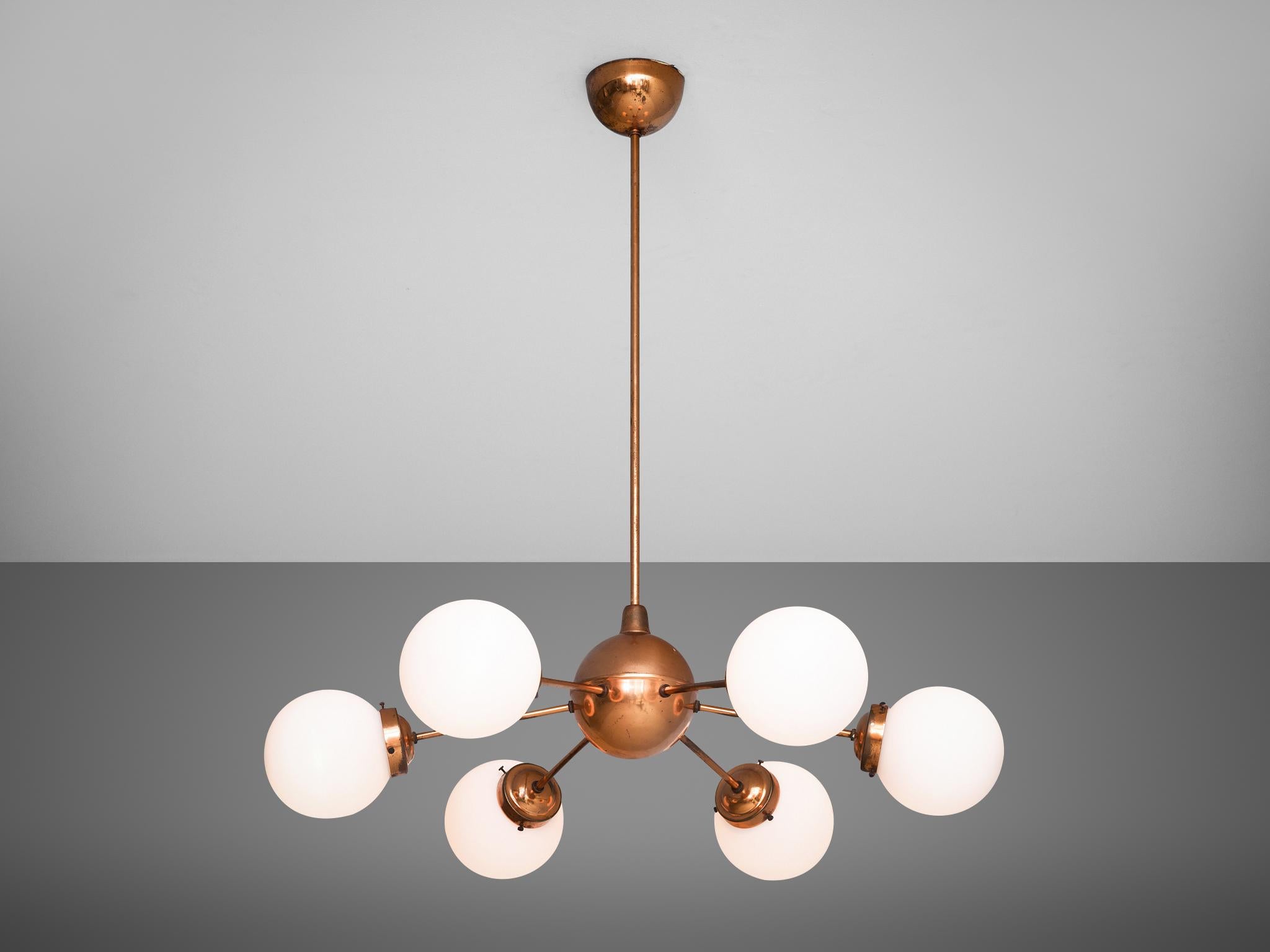 Sputnik chandelier, opal glass, copper, Europe, 1970s

Sputnik chandelier in copper and opaline glass. This chandelier consist of a copper globe with six arms, each with a light point and glass sphere. The stern and canopy are executed in matching