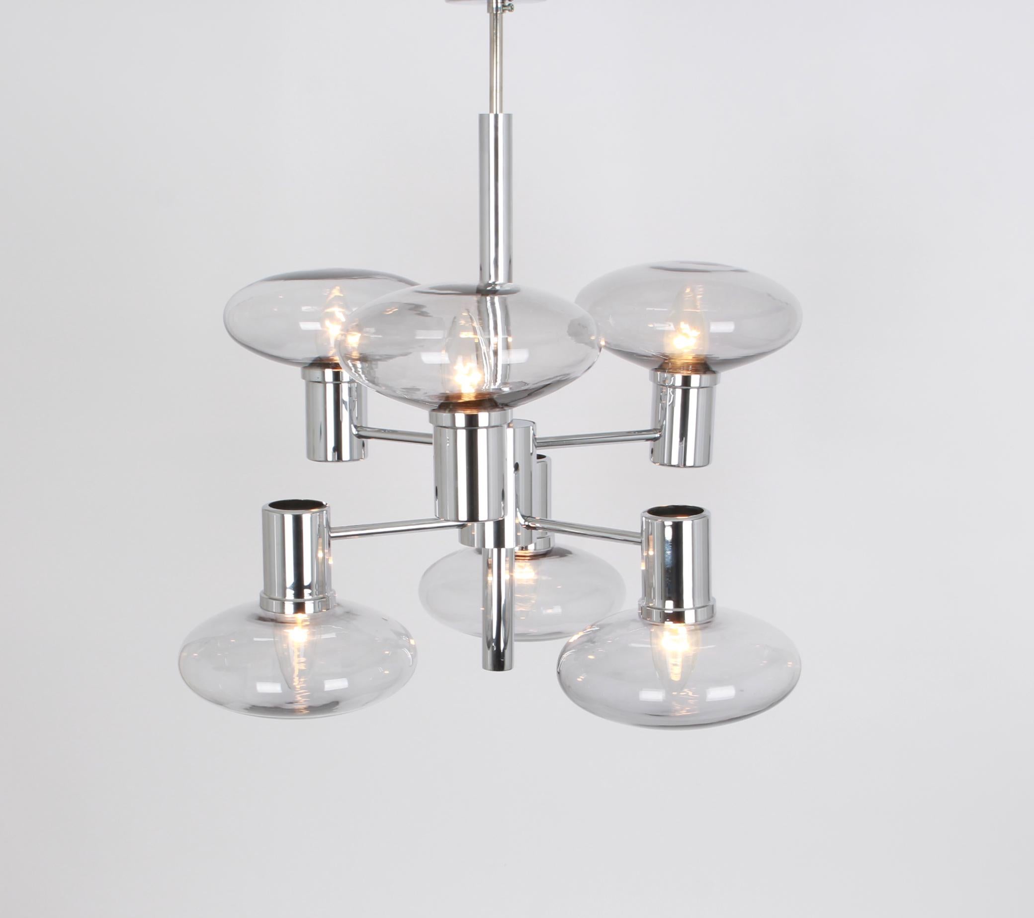 Stunning Chandelier with six smoked glass globes on a chrome frame.
Made by Doria - Wonderful light effect.
Best of the 1960s from Germany.

High quality and in very good condition. Cleaned, well-wired and ready to use. 

The fixture requires