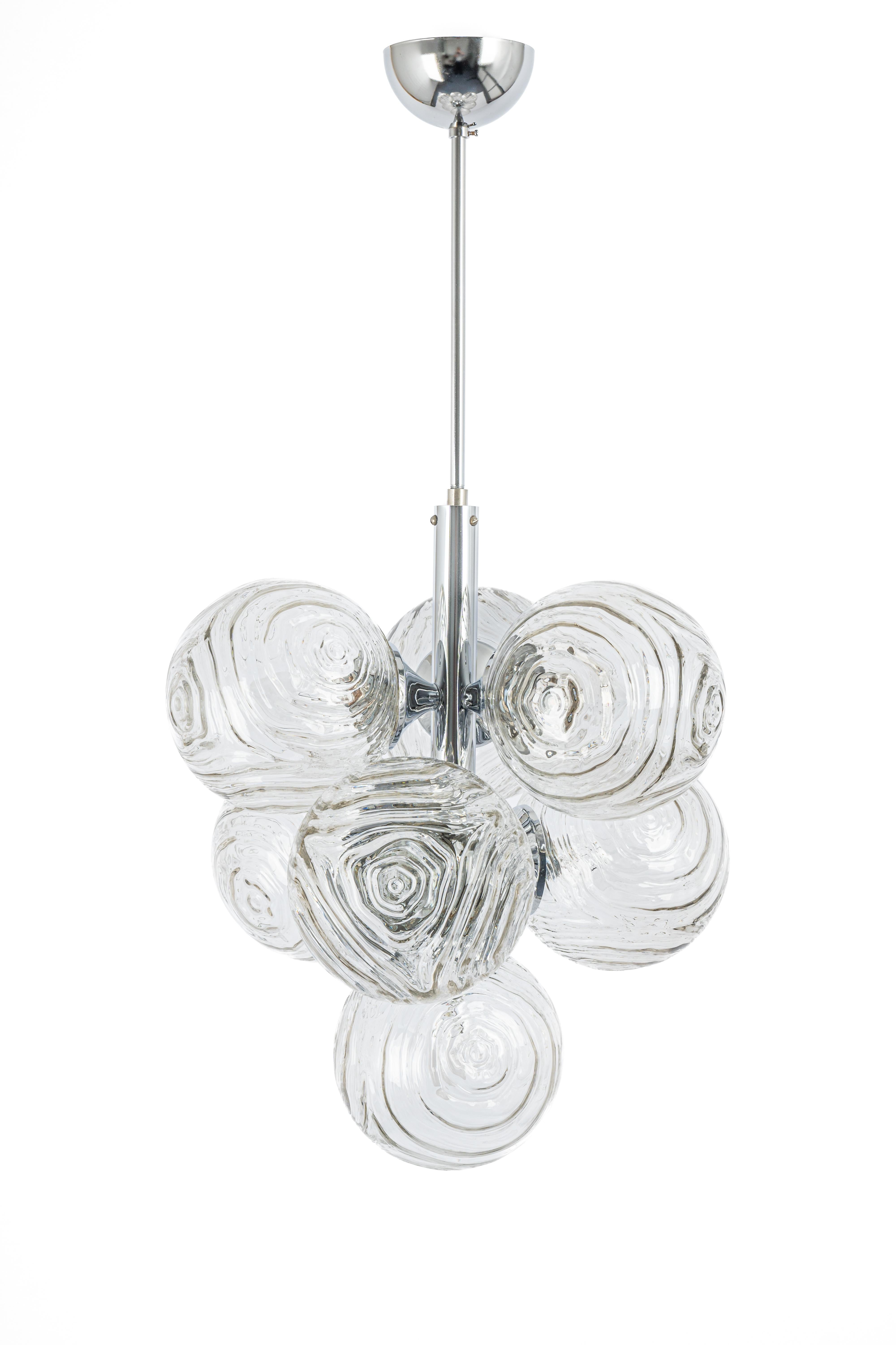 Stunning 6-arm Sputnik chandelier with 7 glass shades by Richard Essig, Germany, 1960s

It needs 7 candelabra size bulbs up to 40 watts each.Light bulbs are not included. It is possible to install this fixture in all countries (US, UK, Europe, Asia,