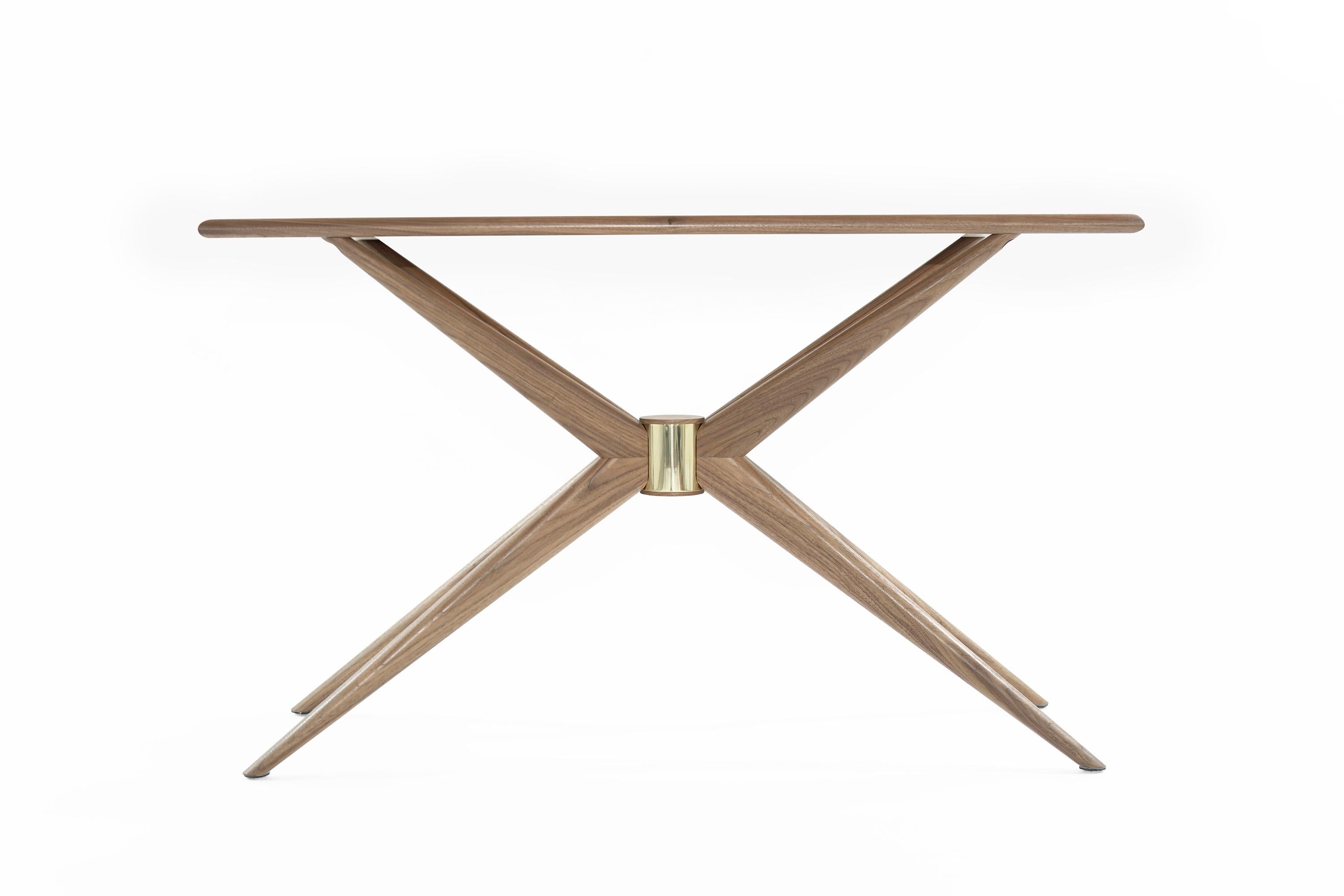 Danish design blends simple aesthetics with lively shapes. The Sputnik Console is inspired by Hans Wegner, and it evokes different energy from every angle. Star-shaped legs appear delicate and uplifting from the side. Head-on, the central brass