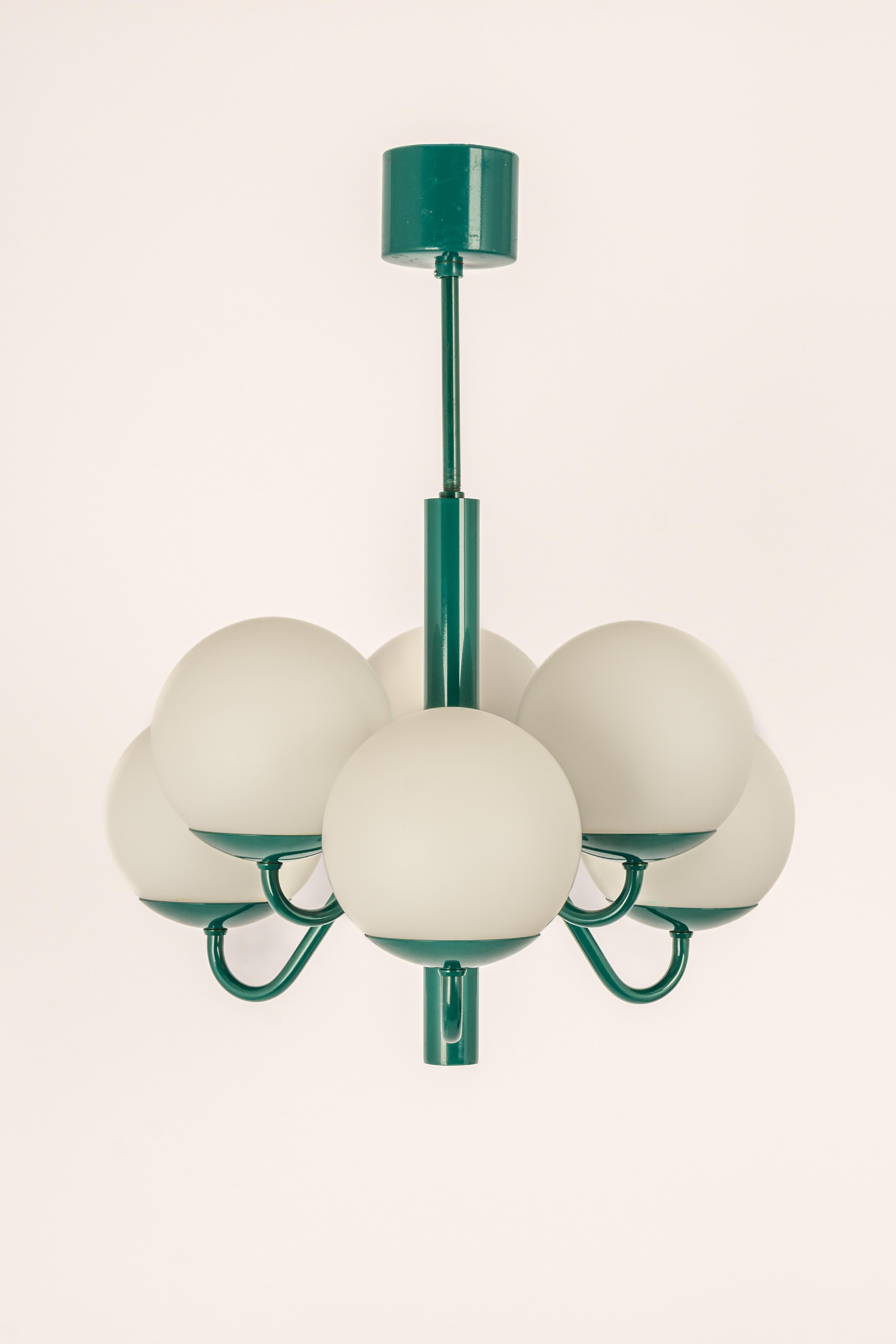 Wonderful Sputnik pendant light made by Kaiser Leuchten, Germany, circa 1970-1979.
Great Atomium-shaped chandelier with 6 opal glasses.

High quality and in very good condition. Cleaned, well-wired, and ready to use. 

Each fixture requires 6 x