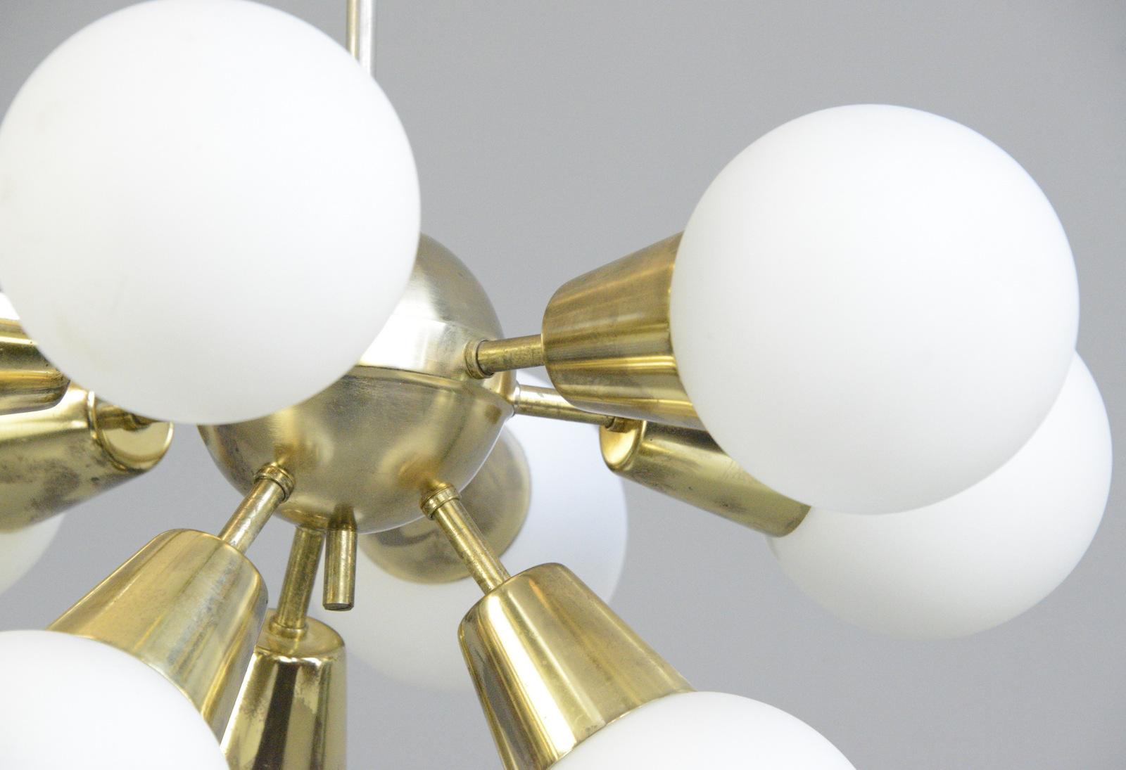 Sputnik pendant light by Kamenicky Senov

- Brass body
- 9 glass balls
- Takes E14 screw fit bulbs
- Comes with low energy LED bulbs included
- Re wired with modern electrical components
- Czech, 1960s
- Measures: 52cm wide x 52cm deep x