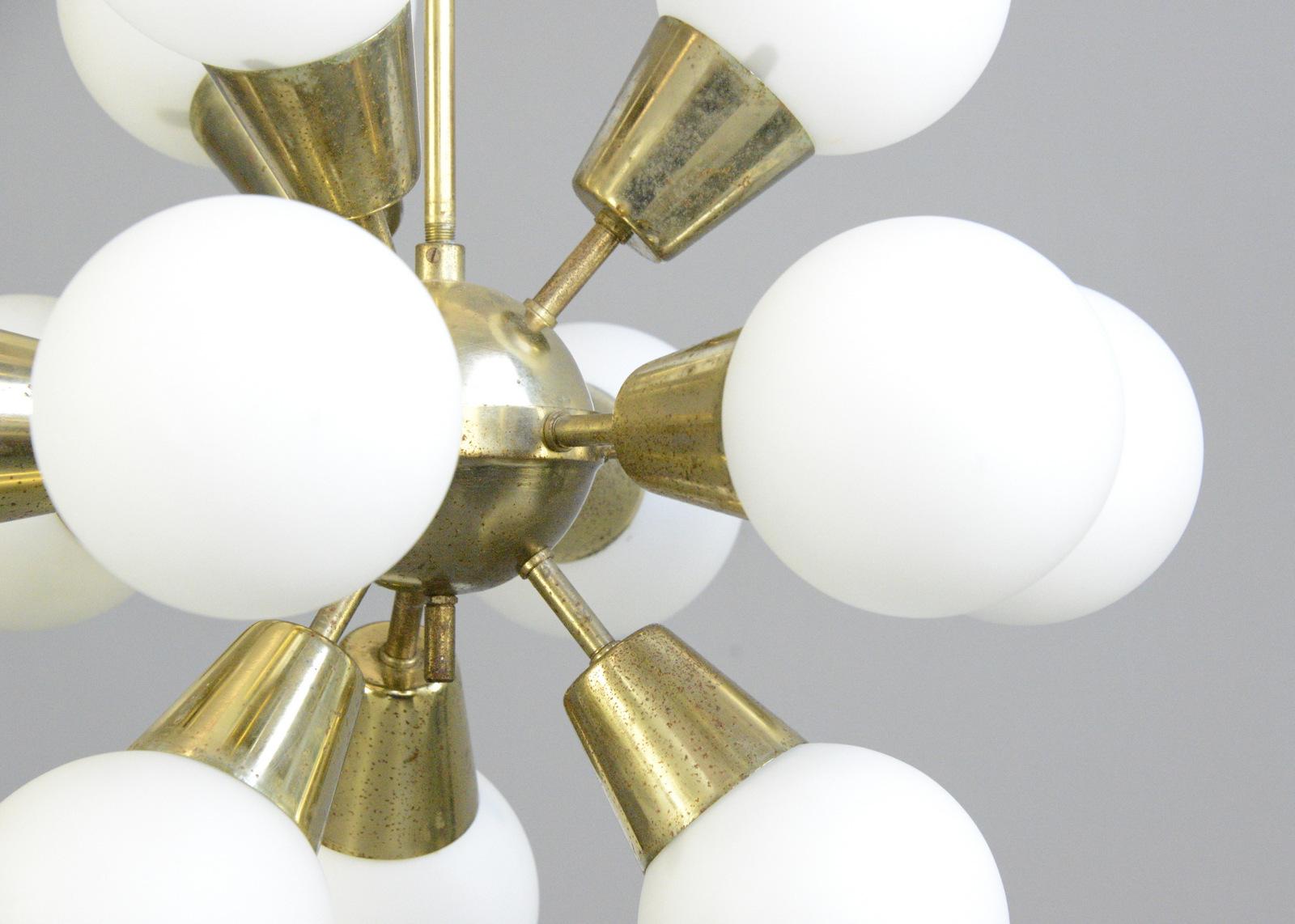 Sputnik pendant light by Kamenicky Senov
-Price is per light, 2 available
- Brass body
- 12 glass balls
- Takes E14 screw fit bulbs
- Comes with low energy LED bulbs included
- Re wired with modern electrical components
- Czech ~ 1960s
- 52cm wide x