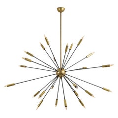 Sputnik-shaped chandelier in patinated gold-plated brass and black lacquer.