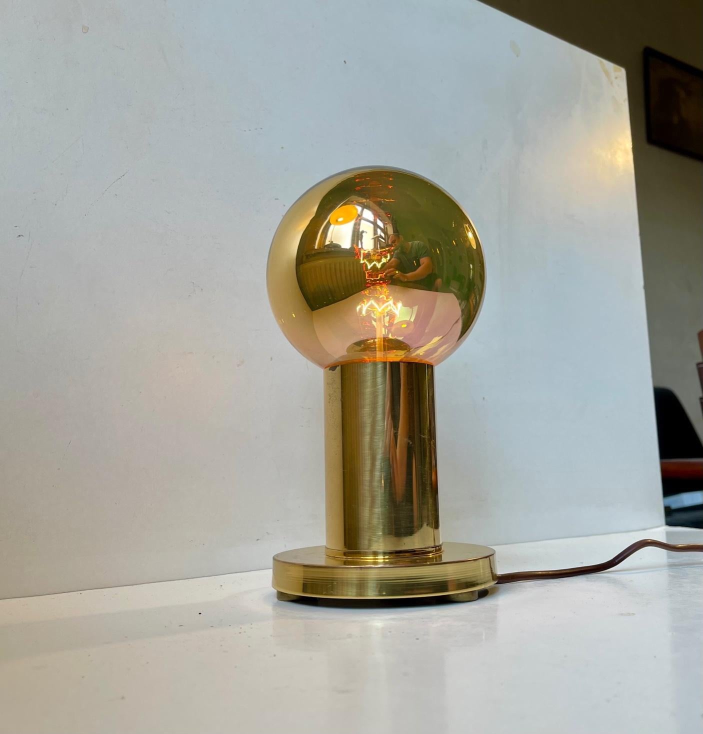 Frimann table light with original golden everlasting mirror/spy bulb. Everlasting? Well these bulbs were discontinued in the 1970s so it has been working for 50 years. Please notice that the light of this type of bulb is not meant to lid up the room