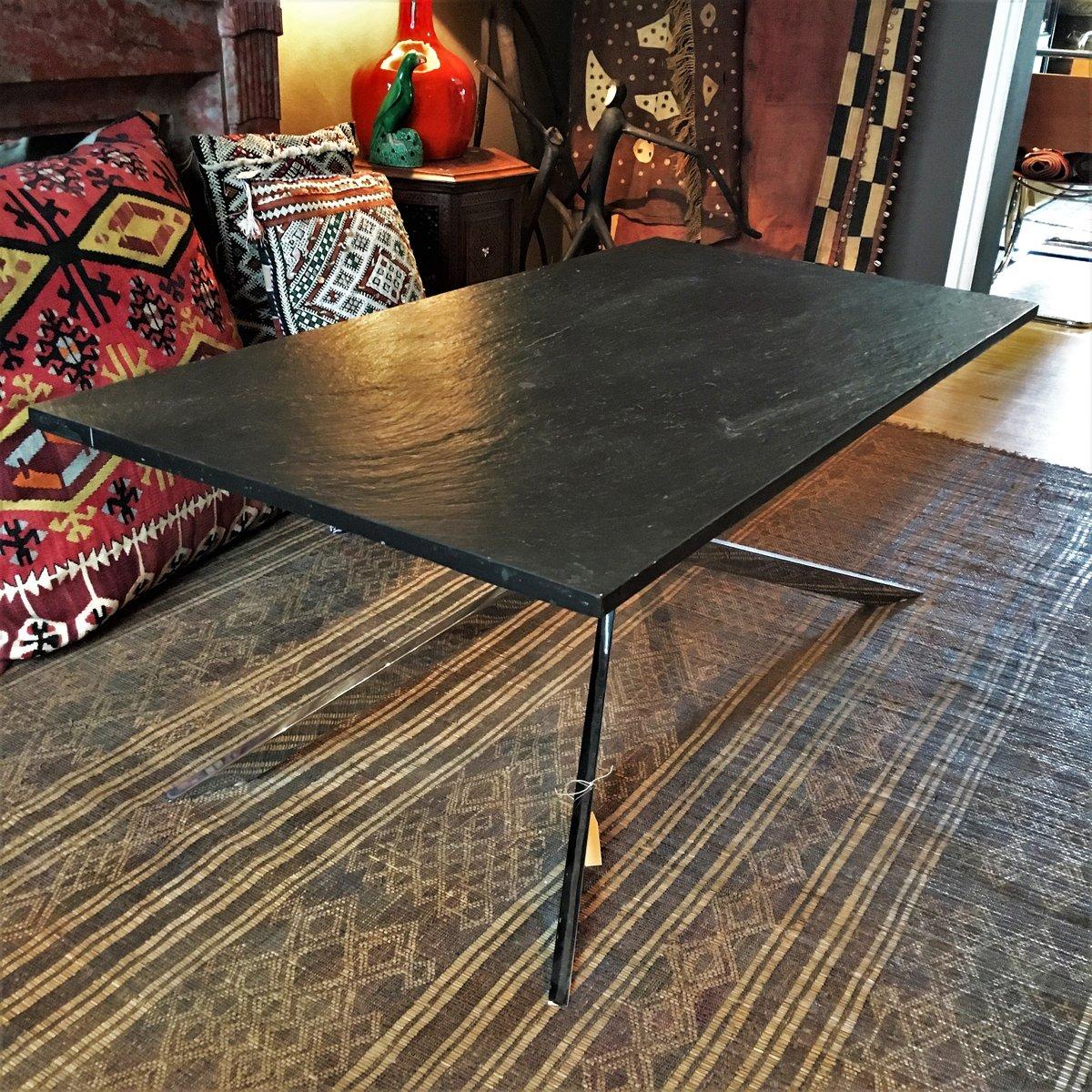 Heavy slate Italian design table.  With a base of polished chrome and a granite top this piece is timeless, elegant & modern all in one! 