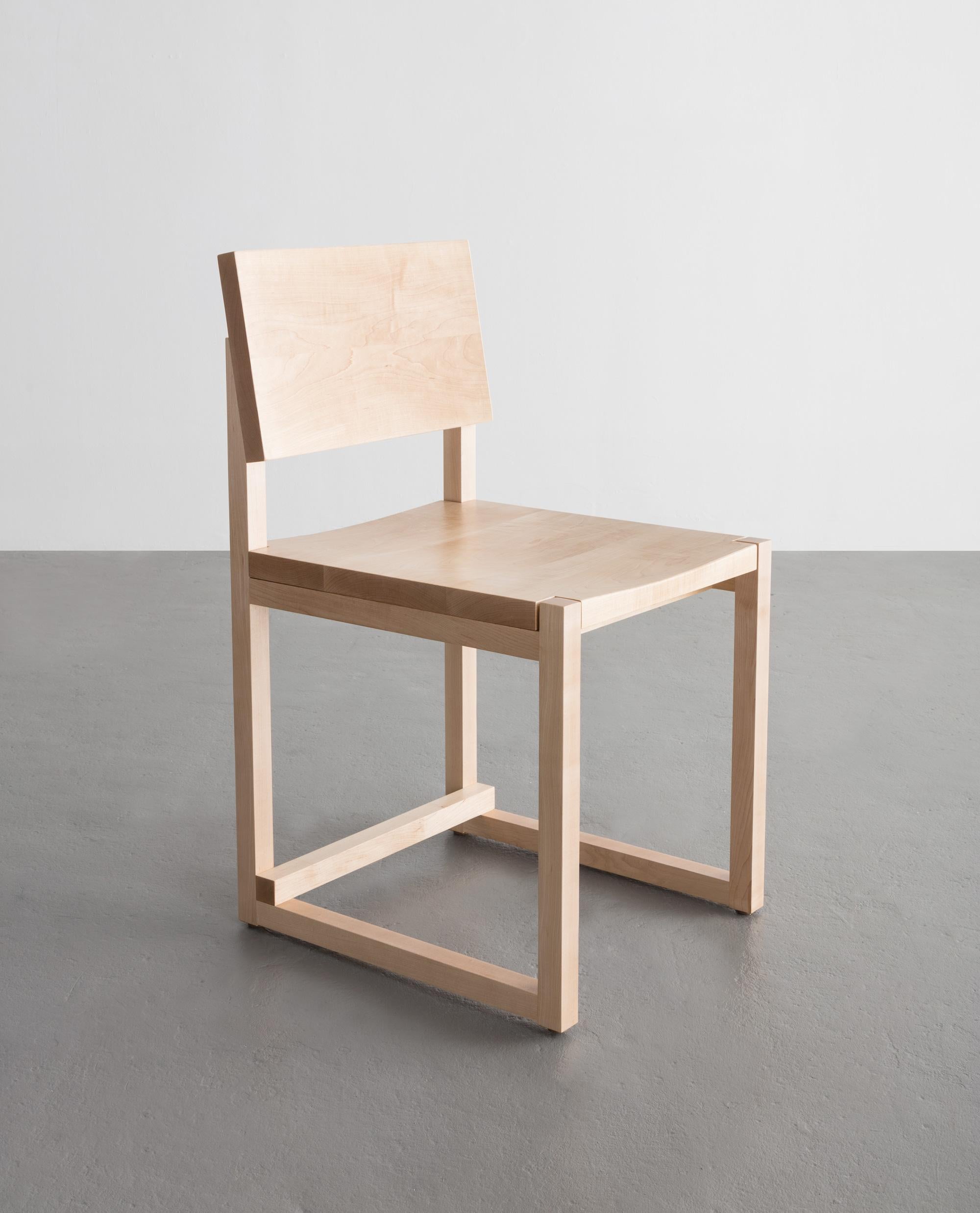The SQ dining chair believes abstraction becomes principle when adhering to straight lines and rectangular forms.
 
Shown in maple and white oak. Also available in ash, cherry, or walnut.
 
