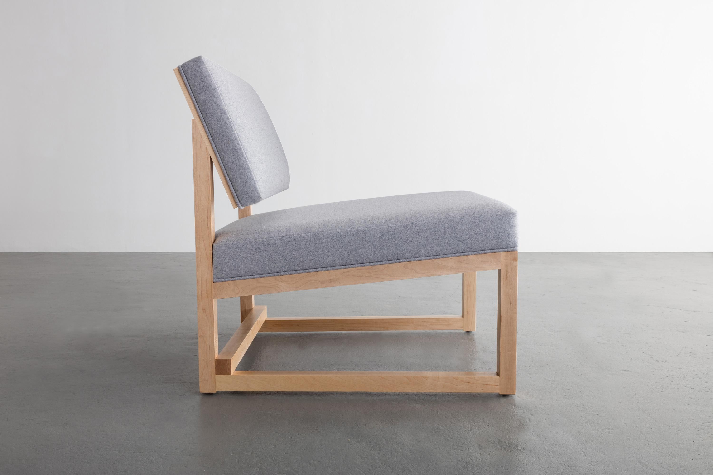 Shown in solid maple and  Divina MD wool felt by Kvadrat. 

Available in solid white oak, maple or walnut
Upholstery in Divina MD wool felt by Kvadrat, or boucle by designtex
Also available in cusomer's own material or leather (COM and COL)

