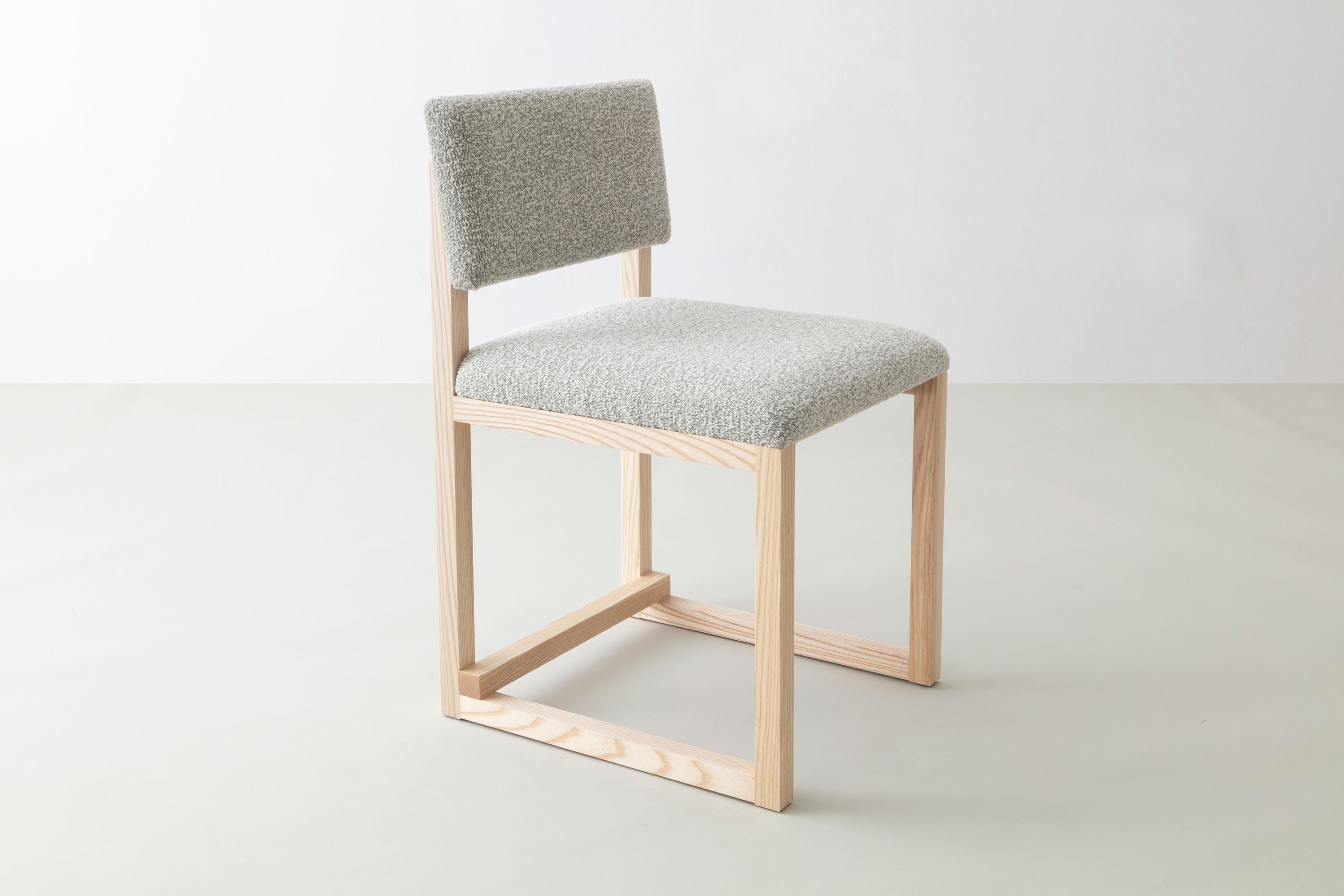 Shown in solid ash, bouclé wool, and brushed brass hardware
 
Available with:
Wood in ash, cherry, maple, walnut, or white oak

Upholstery in customer’s own material or leather (COM+COL) 

Metal in brushed brass, antique brass, oil rubbed bronze, or